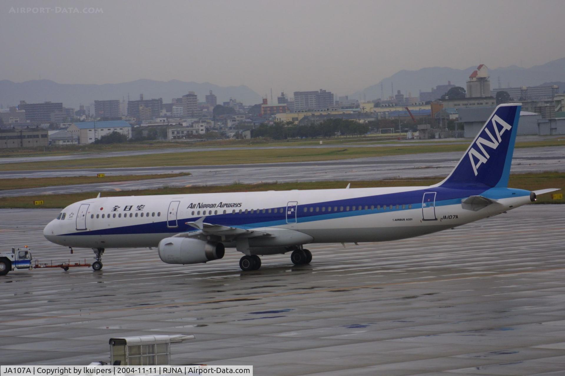 JA107A, 2000 Airbus A321-131 C/N 1227, At a rainy Nagoya Komaki airport