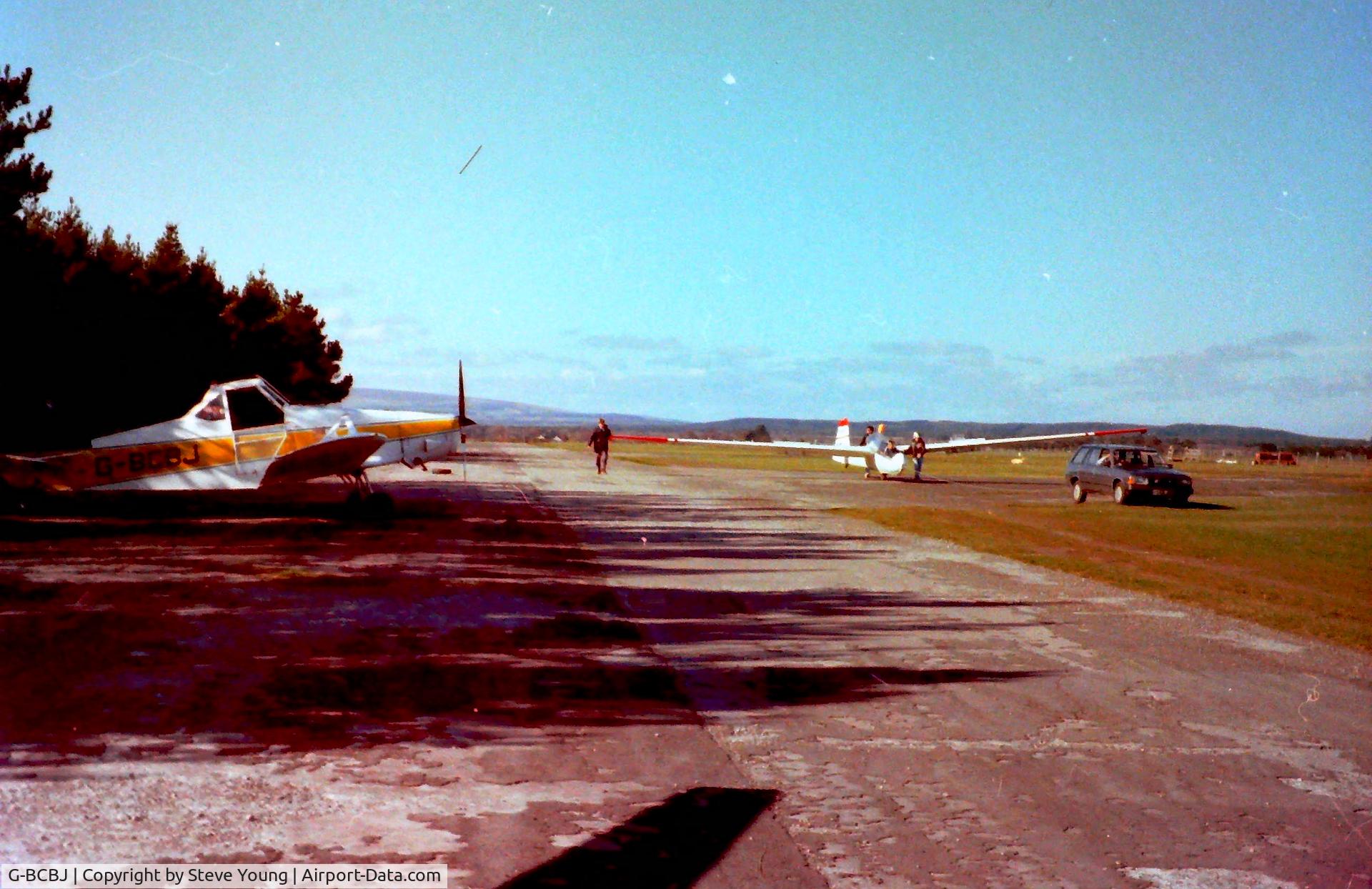 G-BCBJ, 1963 Piper PA-25-235 Pawnee C/N 25-2380/R, Towing at Dallachy, Highland GC, April 1990