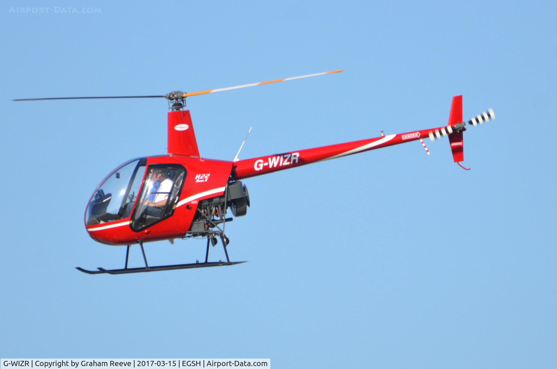 G-WIZR, 1998 Robinson R22 Beta II C/N 2799, Departing from Norwich.