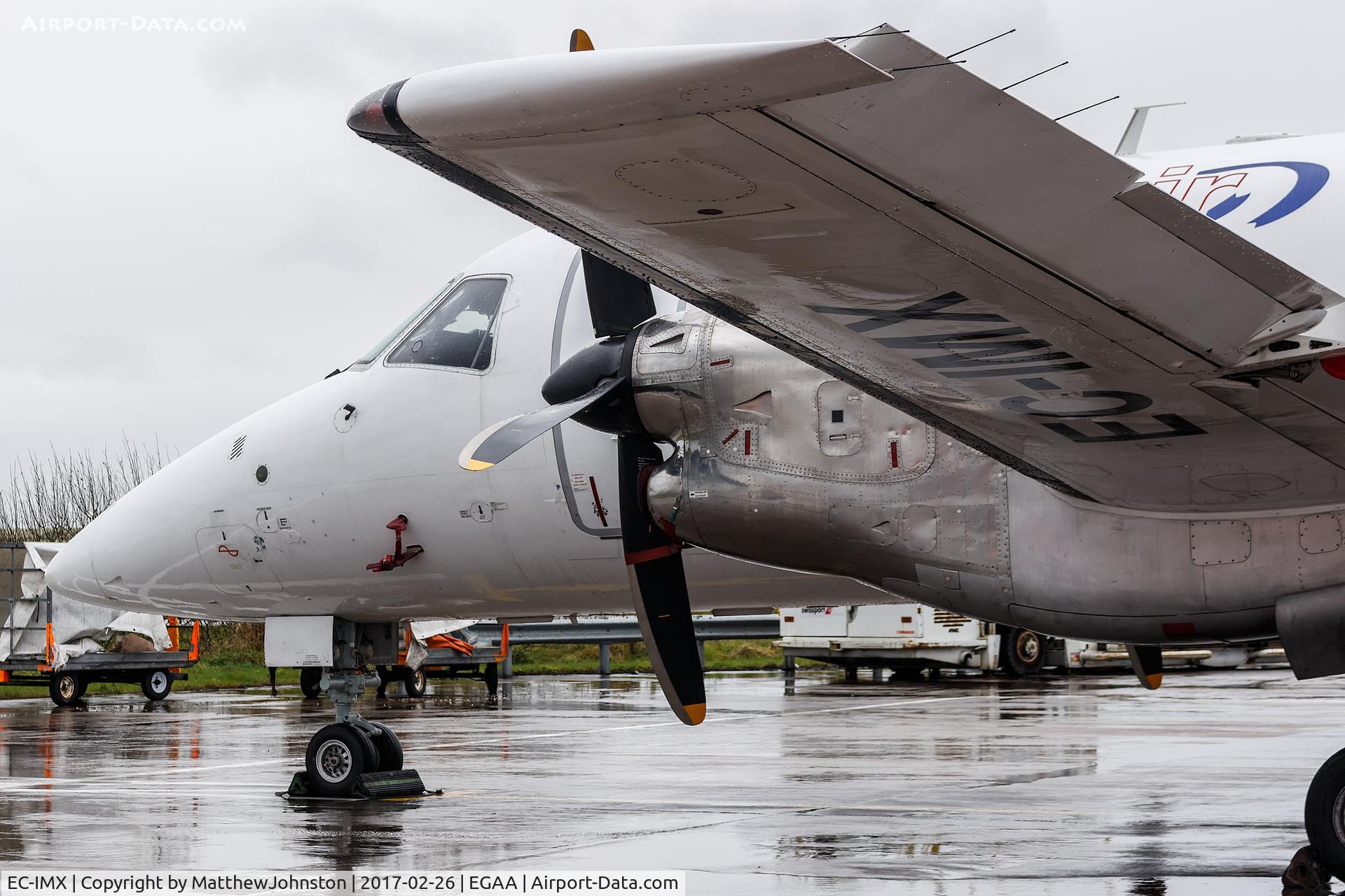 EC-IMX, Embraer EMB-120(ERF) Brasilia C/N 120158, EC-IMX parked on the cargo apron at EGAA BFS