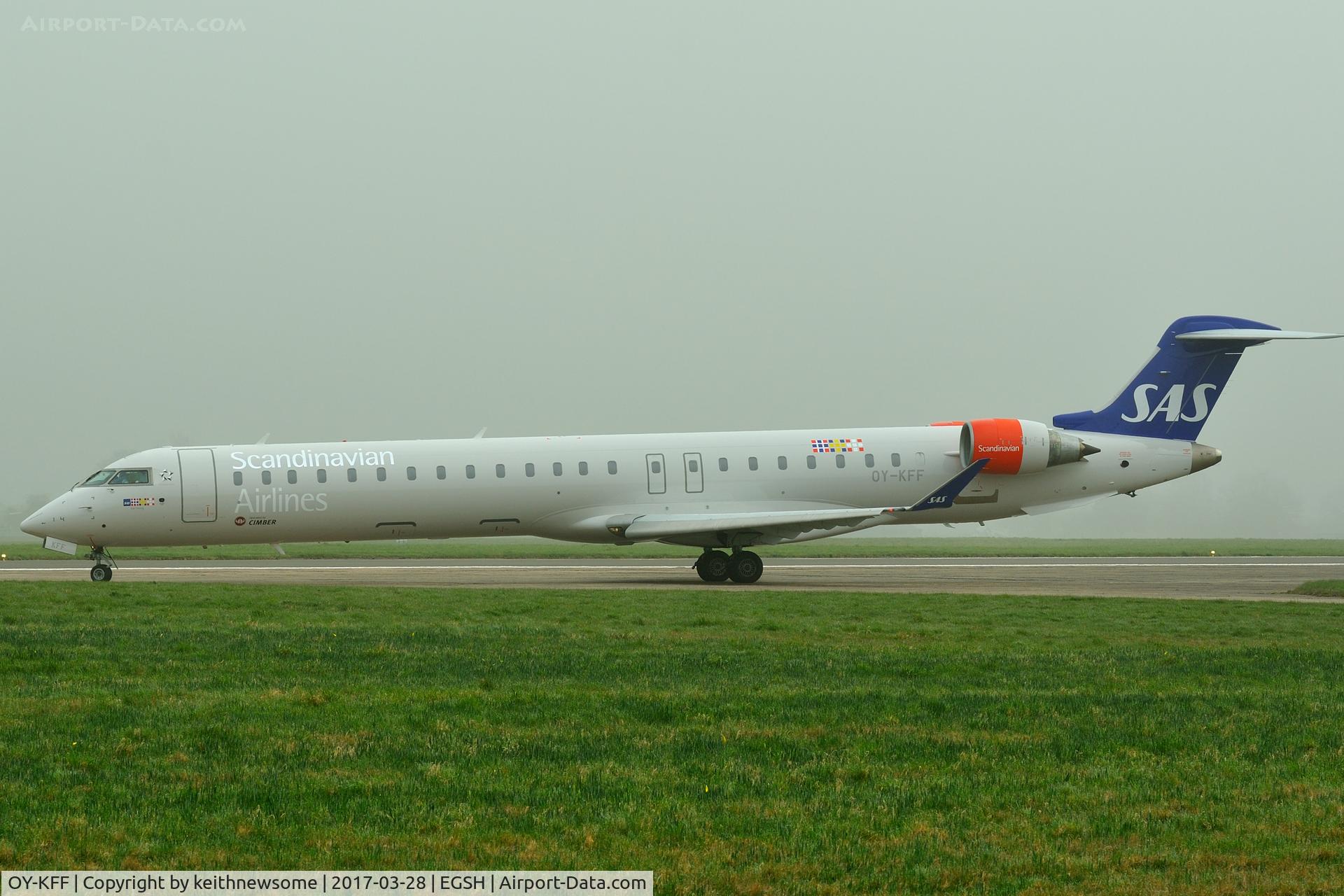 OY-KFF, 2009 Bombardier CRJ-900 (CL-600-2D24) C/N 15231, Leaving foggy Norwich.