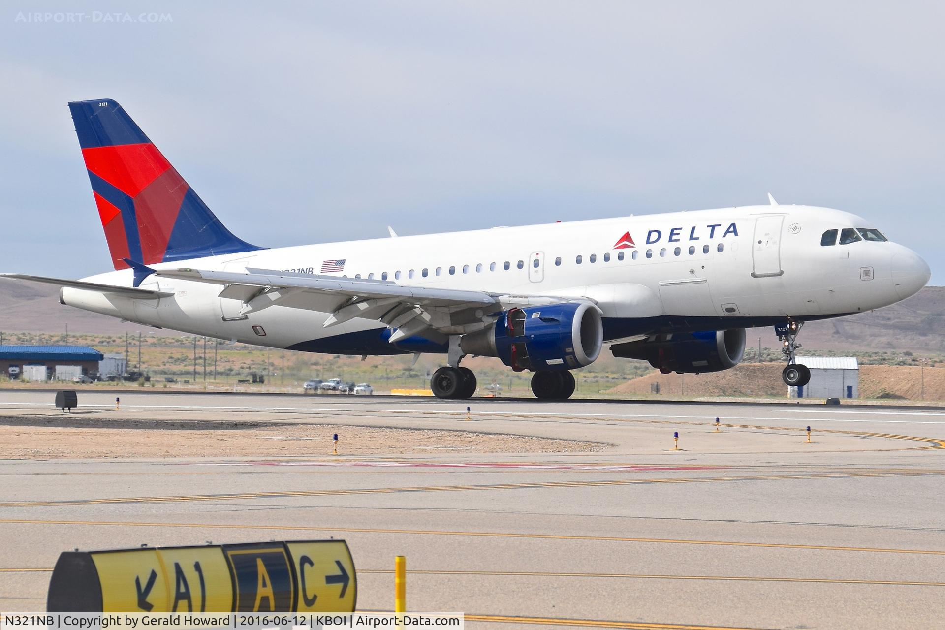 N321NB, 2001 Airbus A319-114 C/N 1414, Reverse thrusters out before nose wheel touched down. Landing RWY 28R.