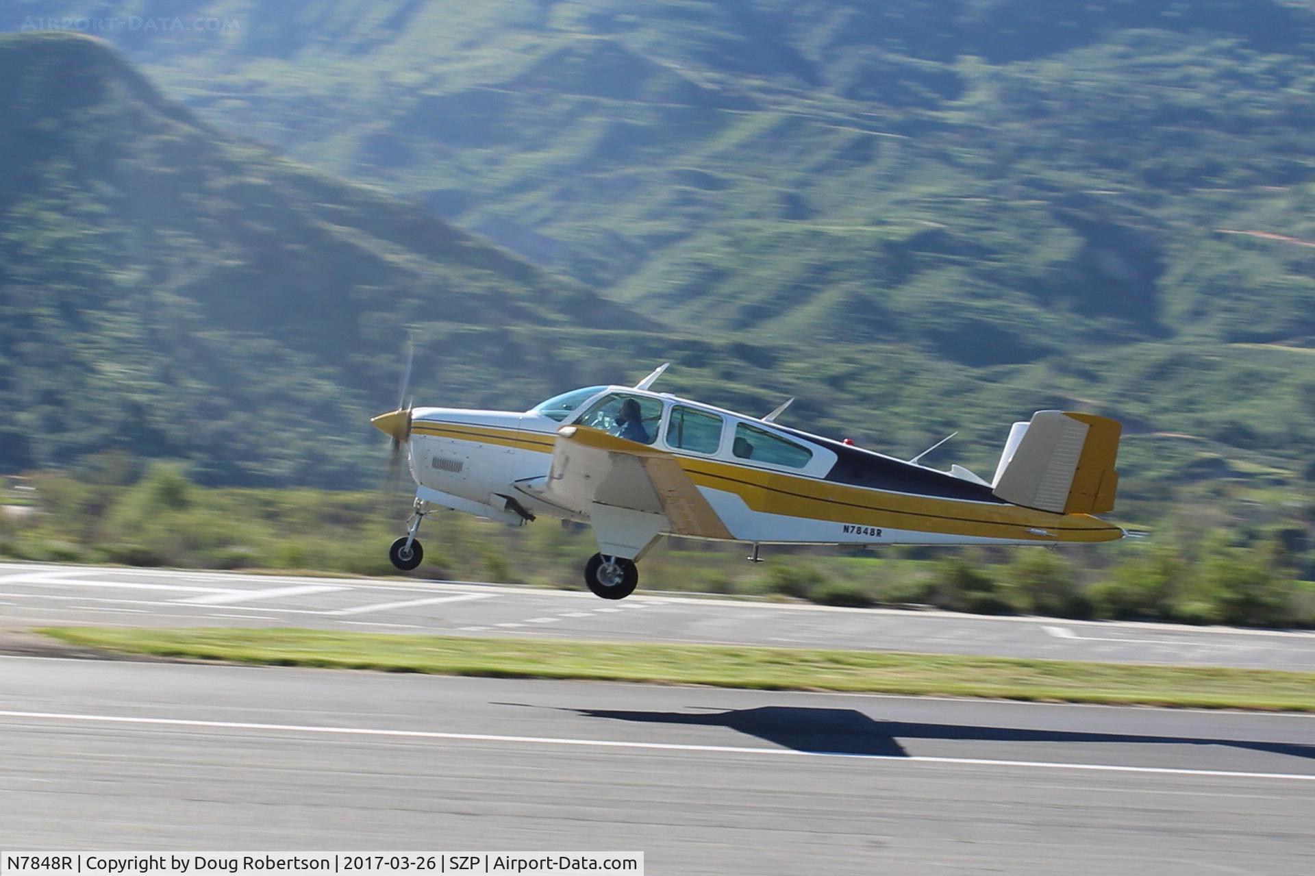 N7848R, 1968 Beech V35A Bonanza C/N D-8904, 1968 Beech V35A BONANZA, Continental IO-550 300 Hp upgrade by STC, takeoff climb Rwy 04, OOPS on the tilt-grab shot!