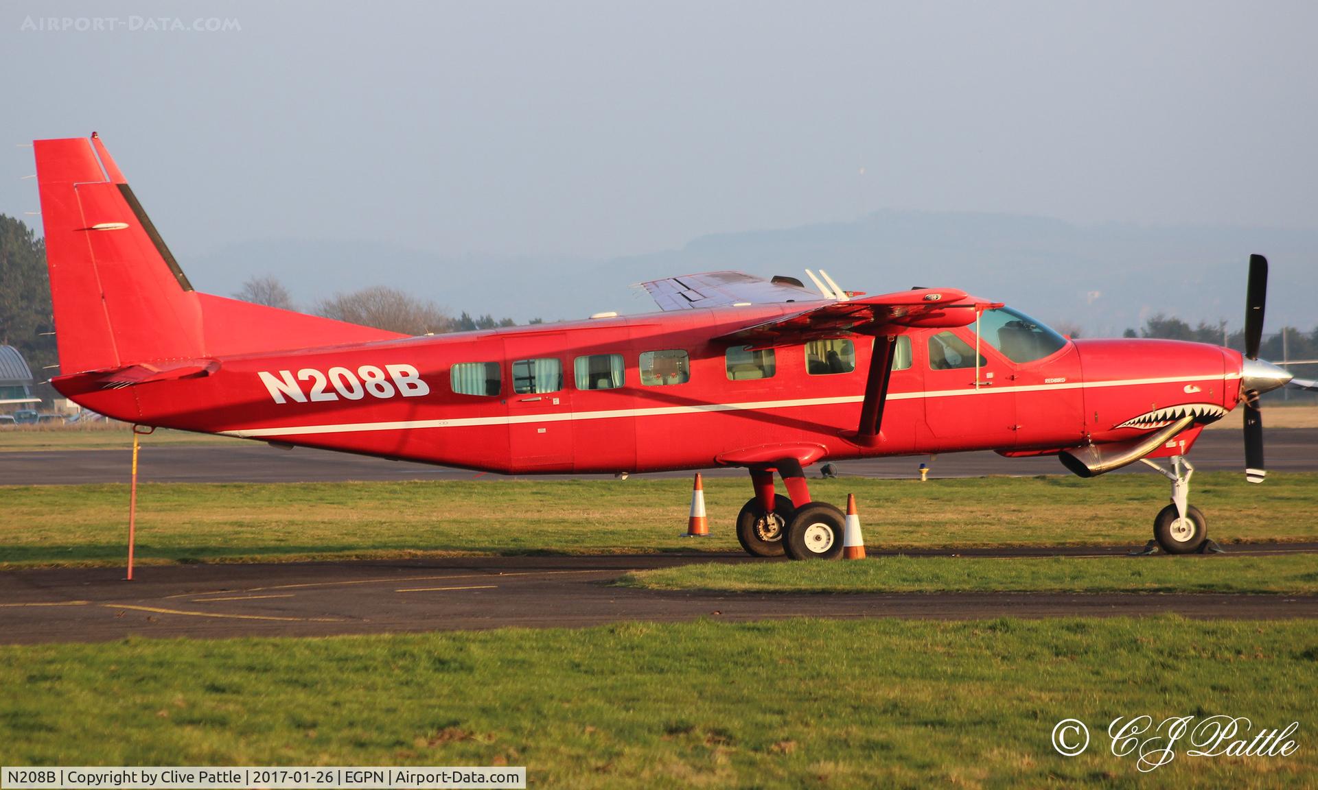 N208B, 2003 Cessna 208B Grand Caravan C/N 208B1023, Brightening up the ramp at Dundee