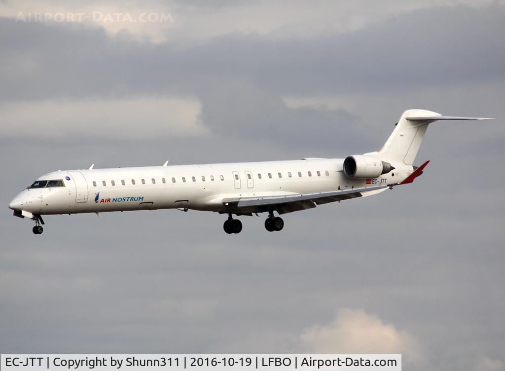 EC-JTT, 2006 Bombardier CRJ-900 (CL-600-2D24) C/N 15074, Landing rwy 32R in white c/s with titles