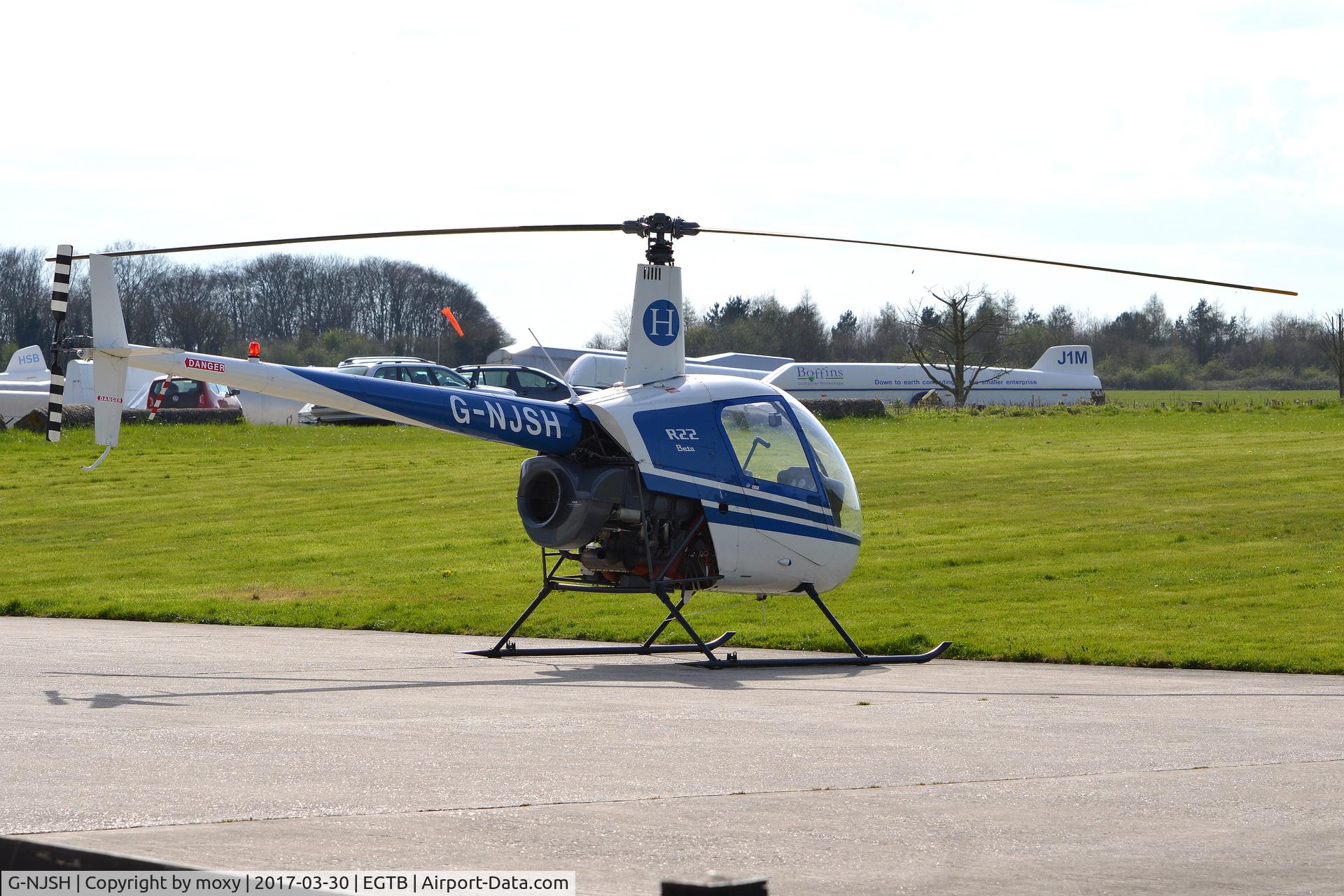 G-NJSH, 1988 Robinson R22 Beta C/N 0780, Robinson R22 Beta at Wycombe Air Park.