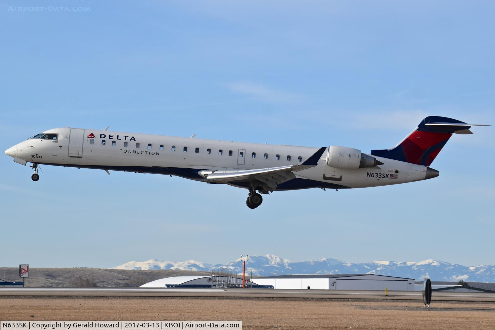 N633SK, 2011 Canadair CL-600-2C10 Regional Jet CRJ-700 C/N 10331, Landing RWY 10L.