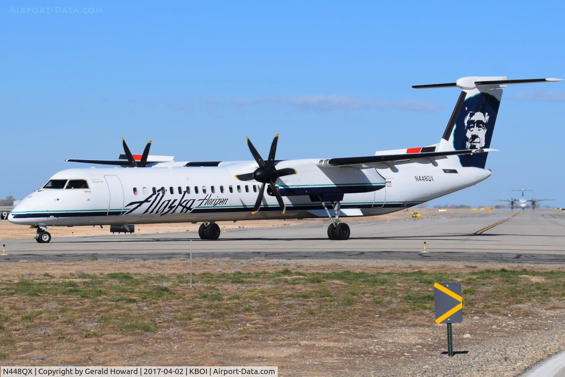 N448QX, 2012 De Havilland Canada DHC-8-402 Dash 8 Dash 8 C/N 4409, Turning off Alpha for RWY 28R.