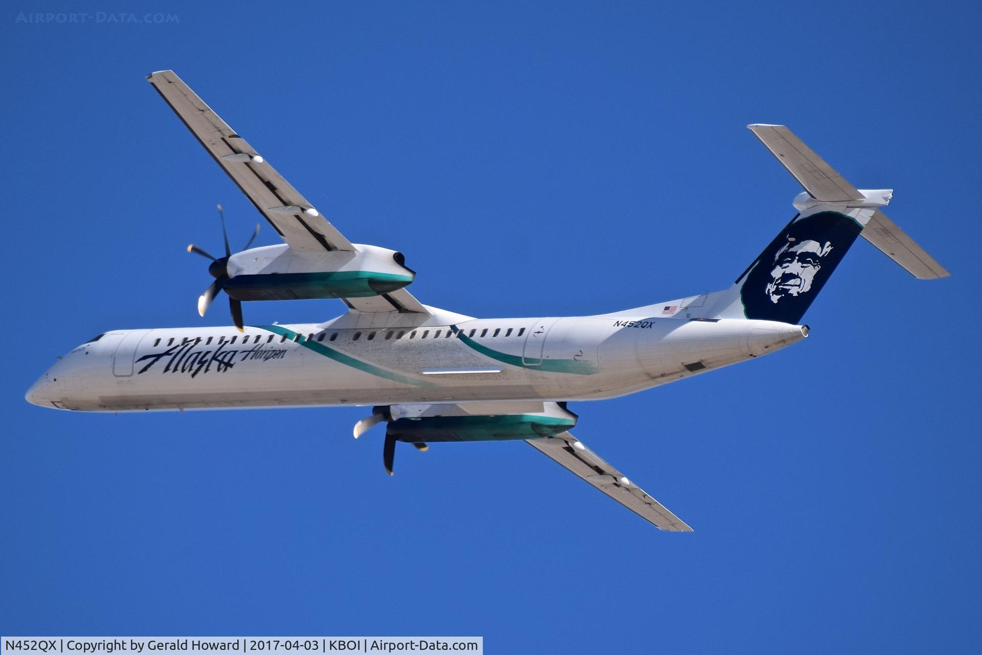 N452QX, 2013 De Havilland Canada DHC-8-402Q Dash 8 Dash 8 C/N 4459, Departing RWN 28R. The dark color between the blue stripes are the signatures of Horizon Air employees.