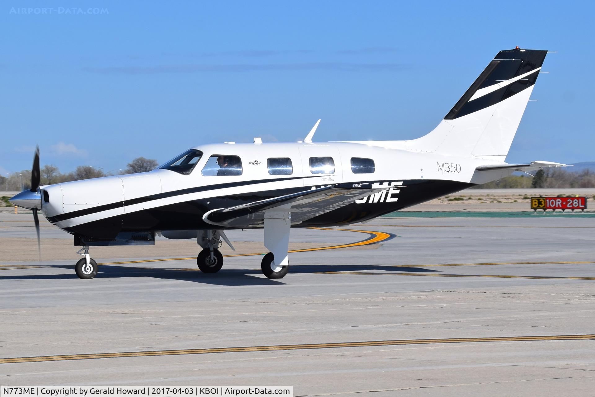 N773ME, 2015 Piper PA-46-350P Malibu Mirage C/N 4636684, Taxiing to the south GA ramp.