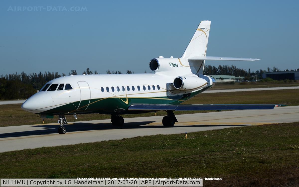 N111MU, 1994 Beech C90A King Air C/N LJ-1367, Falcon 900 taxiing to take off.