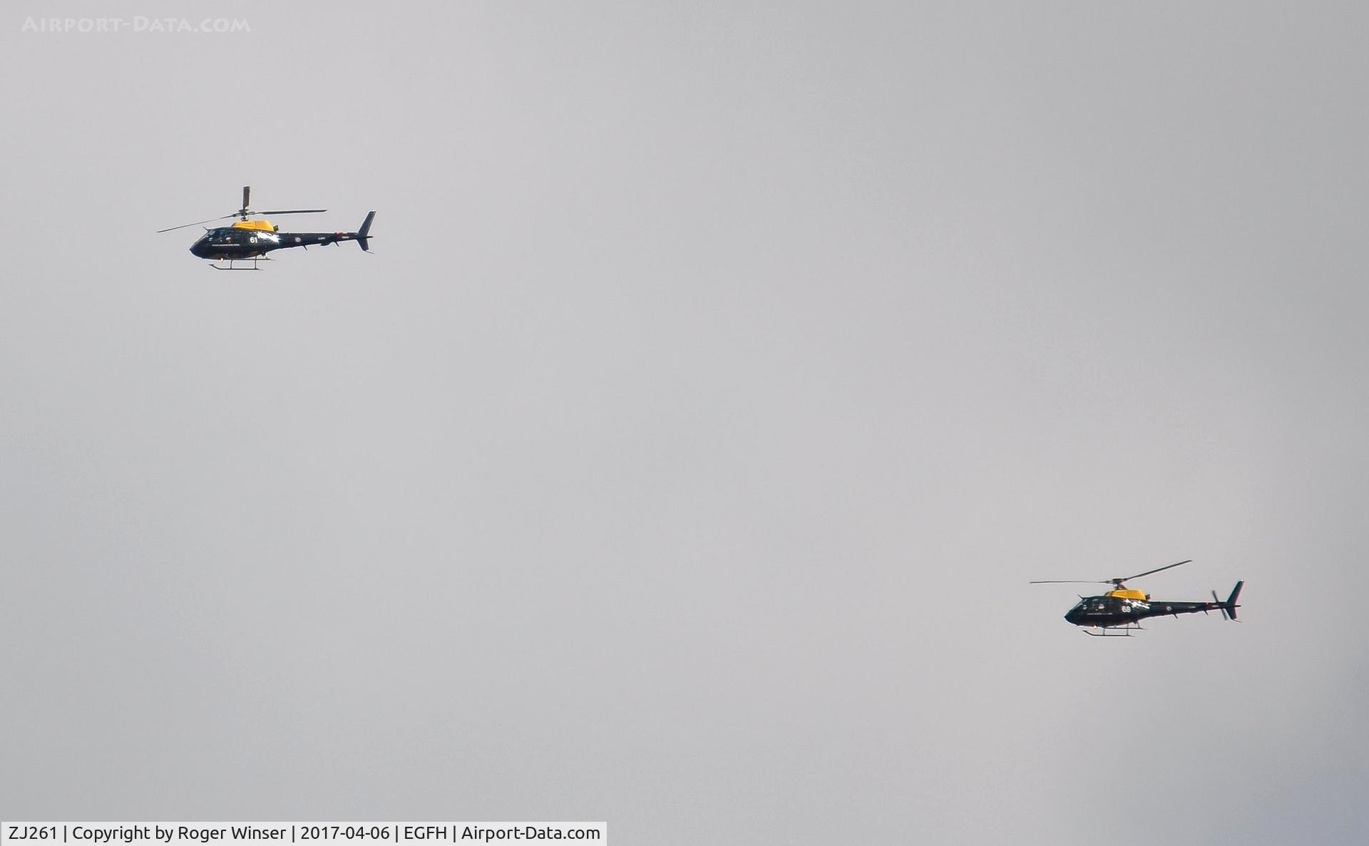 ZJ261, 1997 Eurocopter AS-350BB Squirrel HT1 Ecureuil C/N 2986, Shawbury 16 formation (ZJ261 leading ZJ268) of RAF Eurocopter Ecureuil helicopters over the airport.
