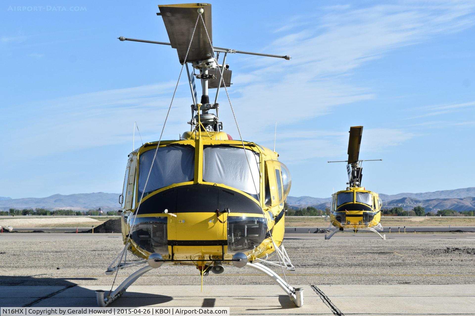 N16HX, 1979 Bell 205A-1 C/N 30293, Parked on south GA ramp. N37HX parked in back ground.