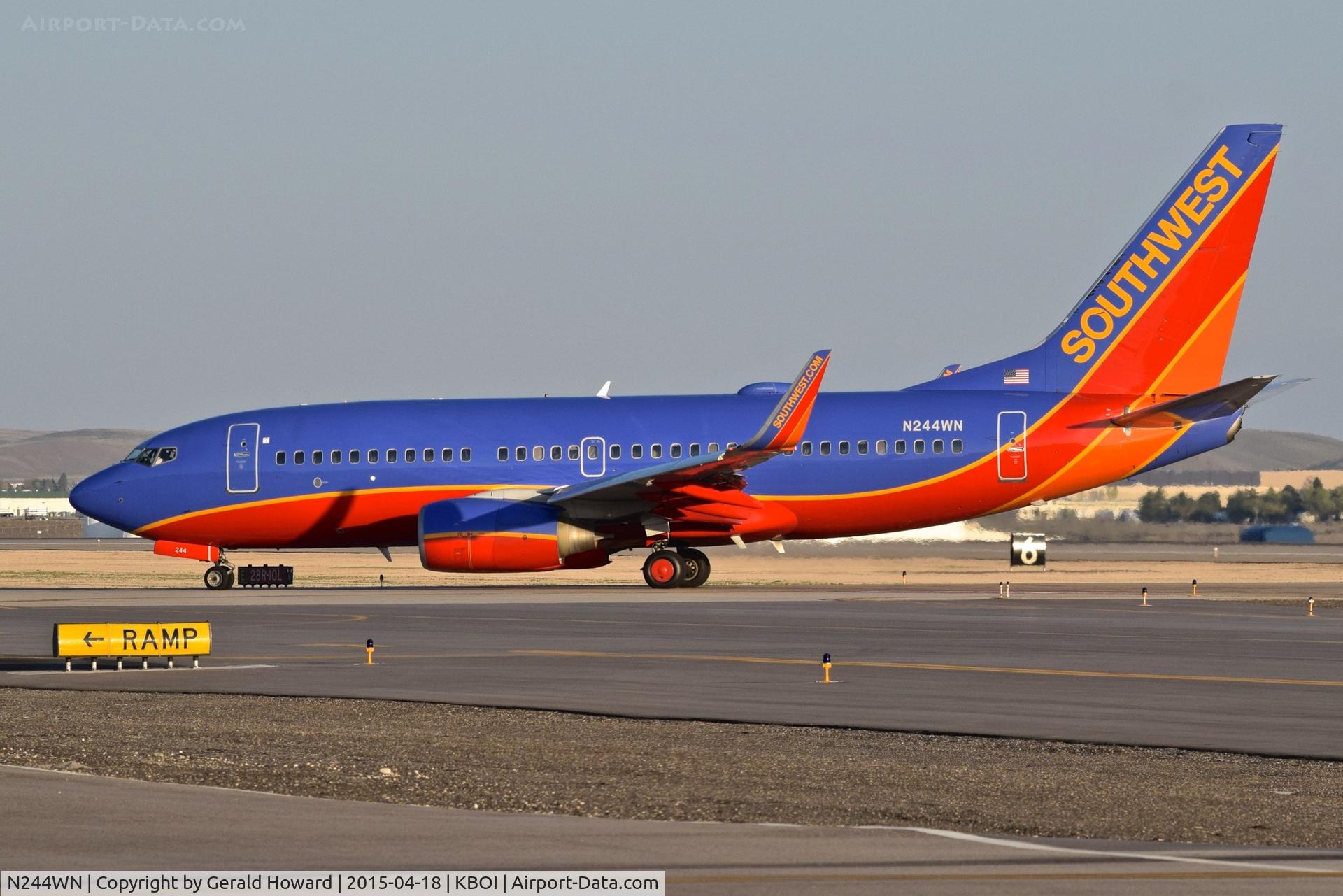 N244WN, 2006 Boeing 737-7H4 C/N 34864, Coming off RWY 10L for the ramp.