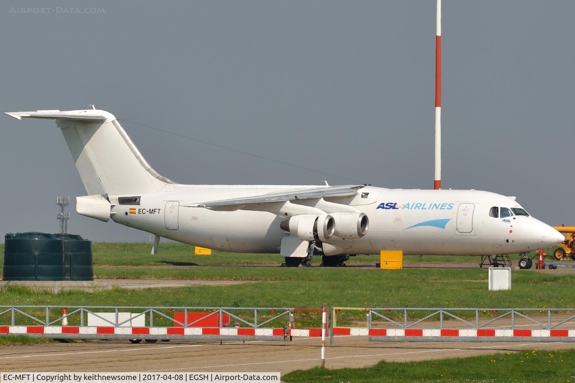 EC-MFT, 1990 British Aerospace BAe-146-300QT Quiet Trader C/N E3182, Parked in maintenance area.