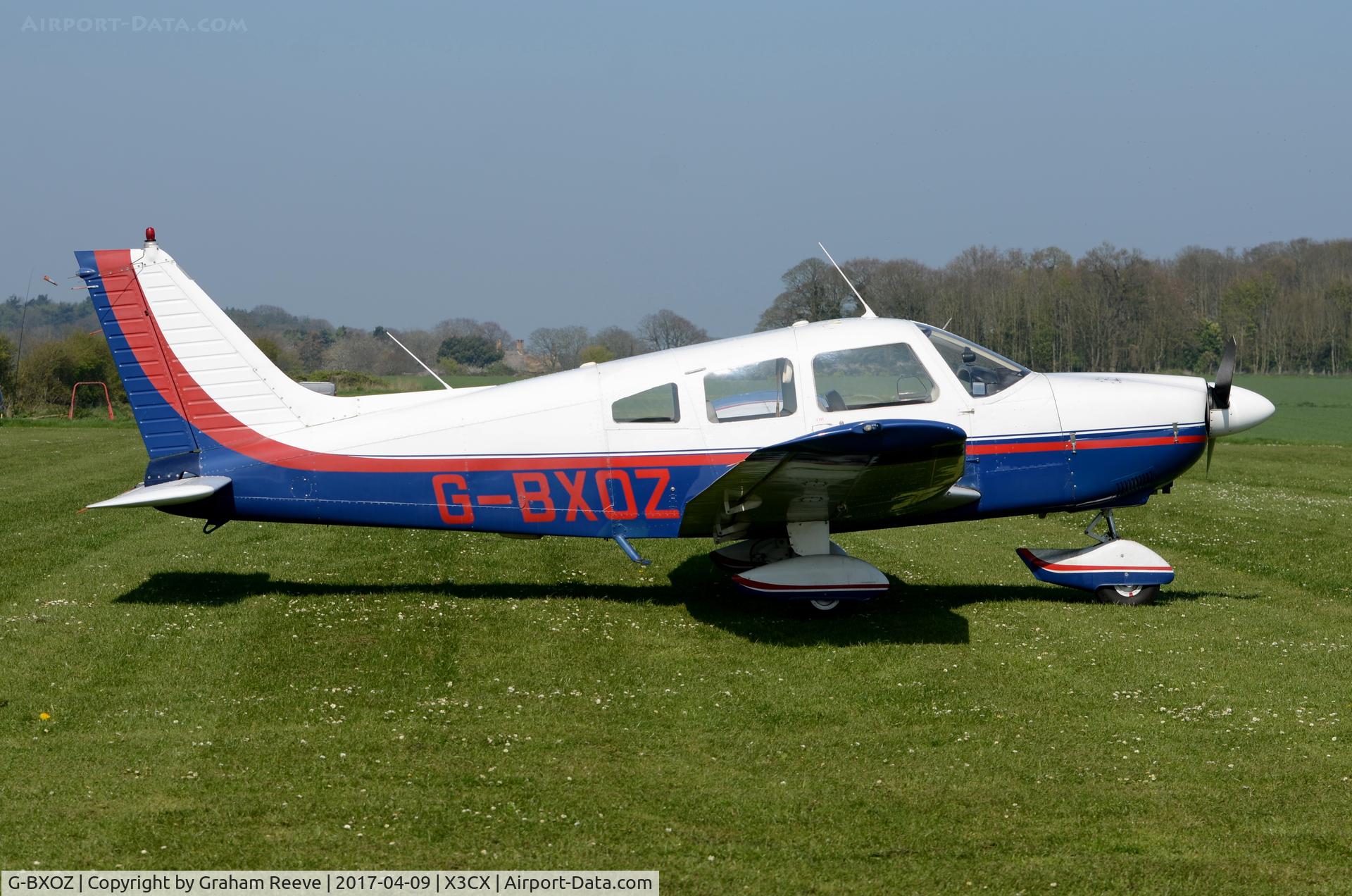 G-BXOZ, 1977 Piper PA-28-181 Cherokee Archer II C/N 28-7790173, Parked at Northrepps.