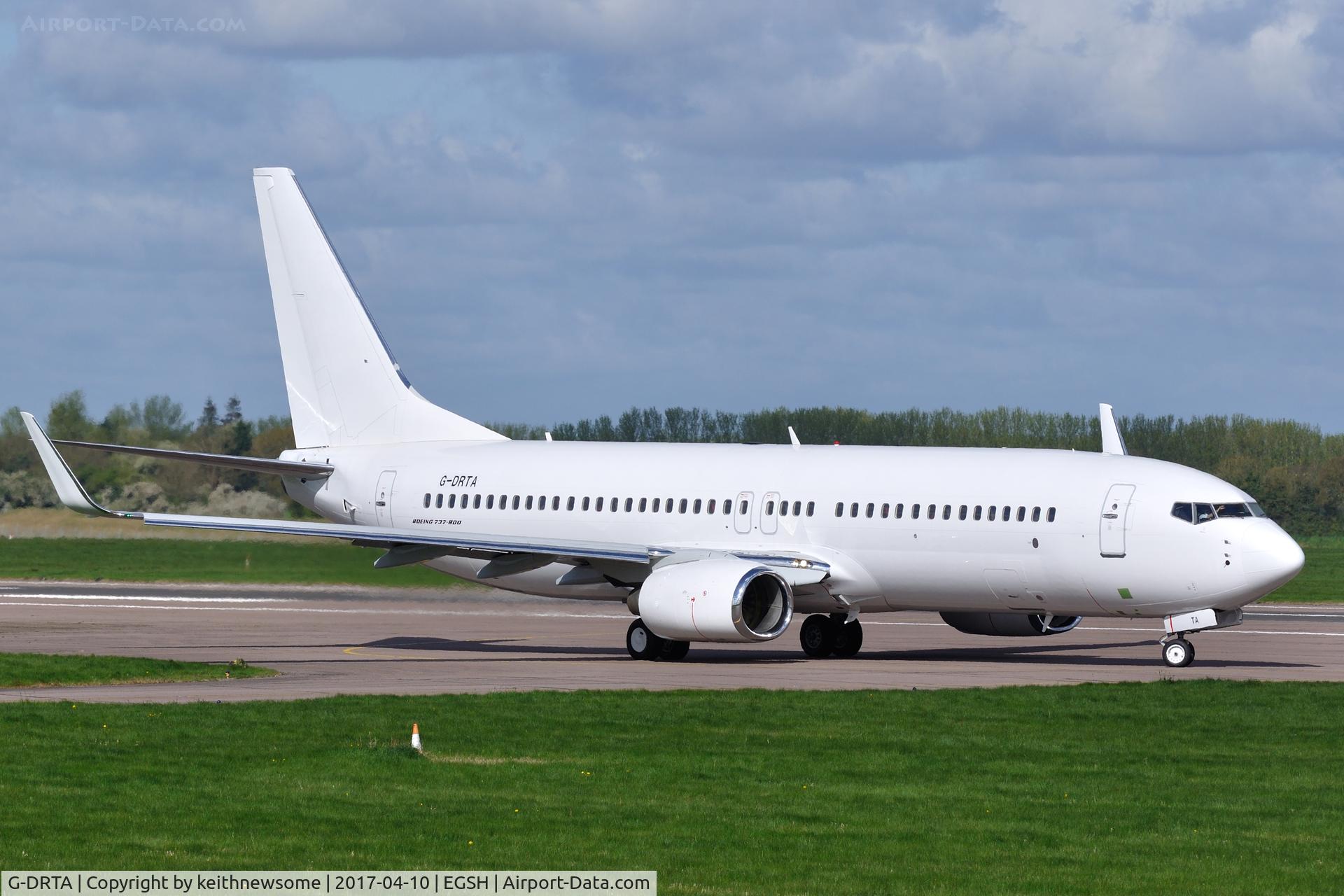 G-DRTA, 2004 Boeing 737-85P C/N 33972, Leaving Norwich for an air test.