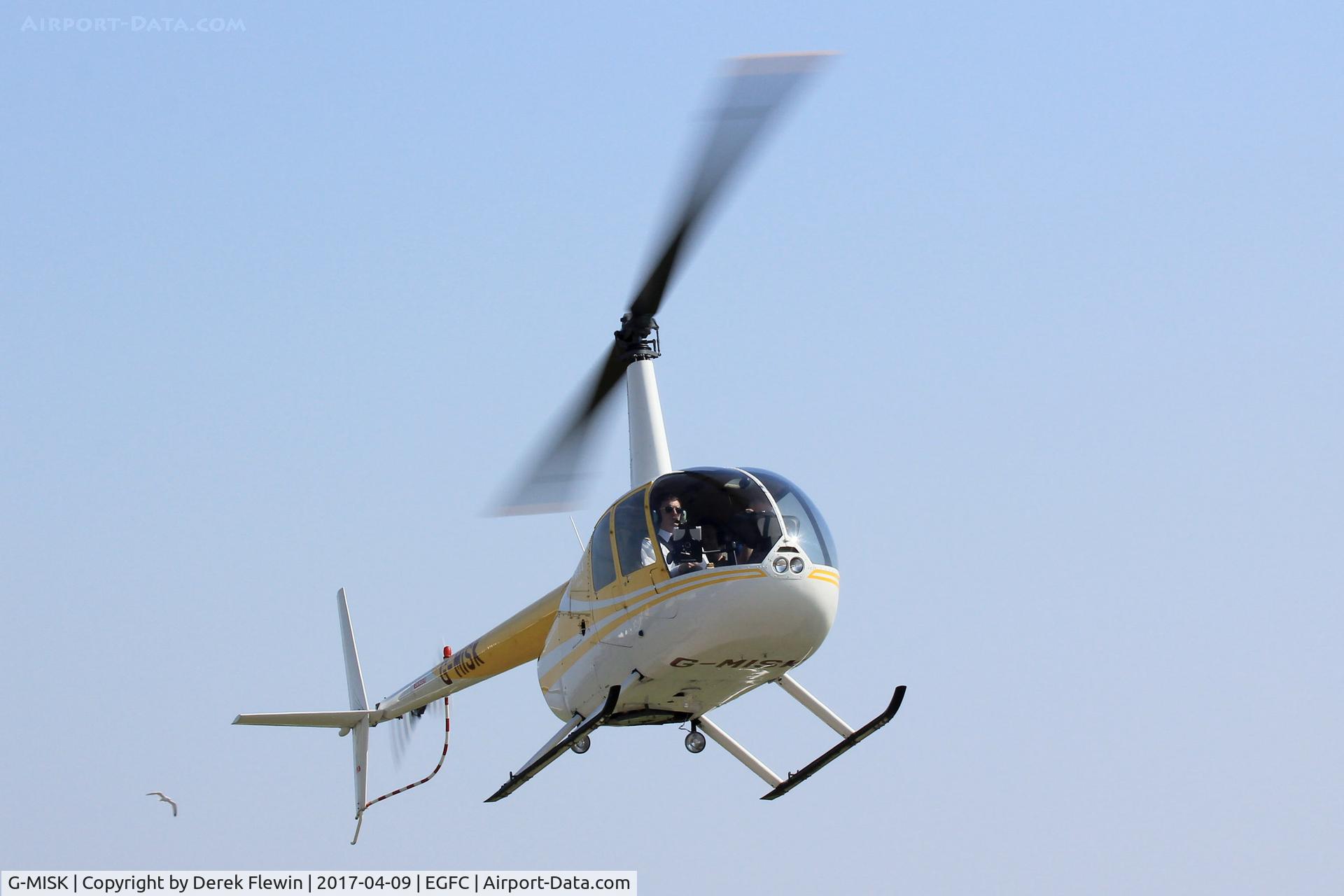G-MISK, 1998 Robinson R44 Astro C/N 0520, Astro, Roe Contractors Ltd Wellesbourne Mountford Warwickshire based, previously G-BYCE, seen giving passenger flights at the Cardiff Heliport Open Day.