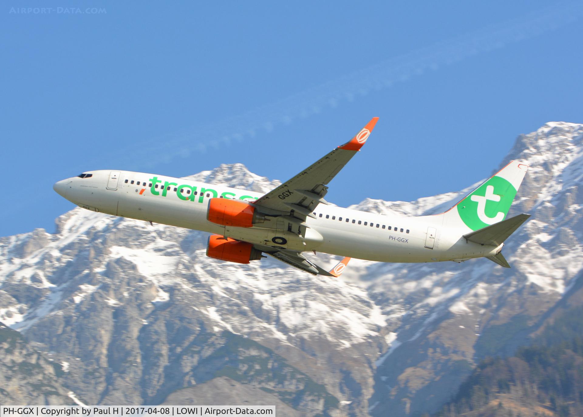 PH-GGX, 2010 Boeing 737-8EH C/N 36596, Transavia B737 rocketing out of LOWI, Innsbruck with the austrian alps in the background