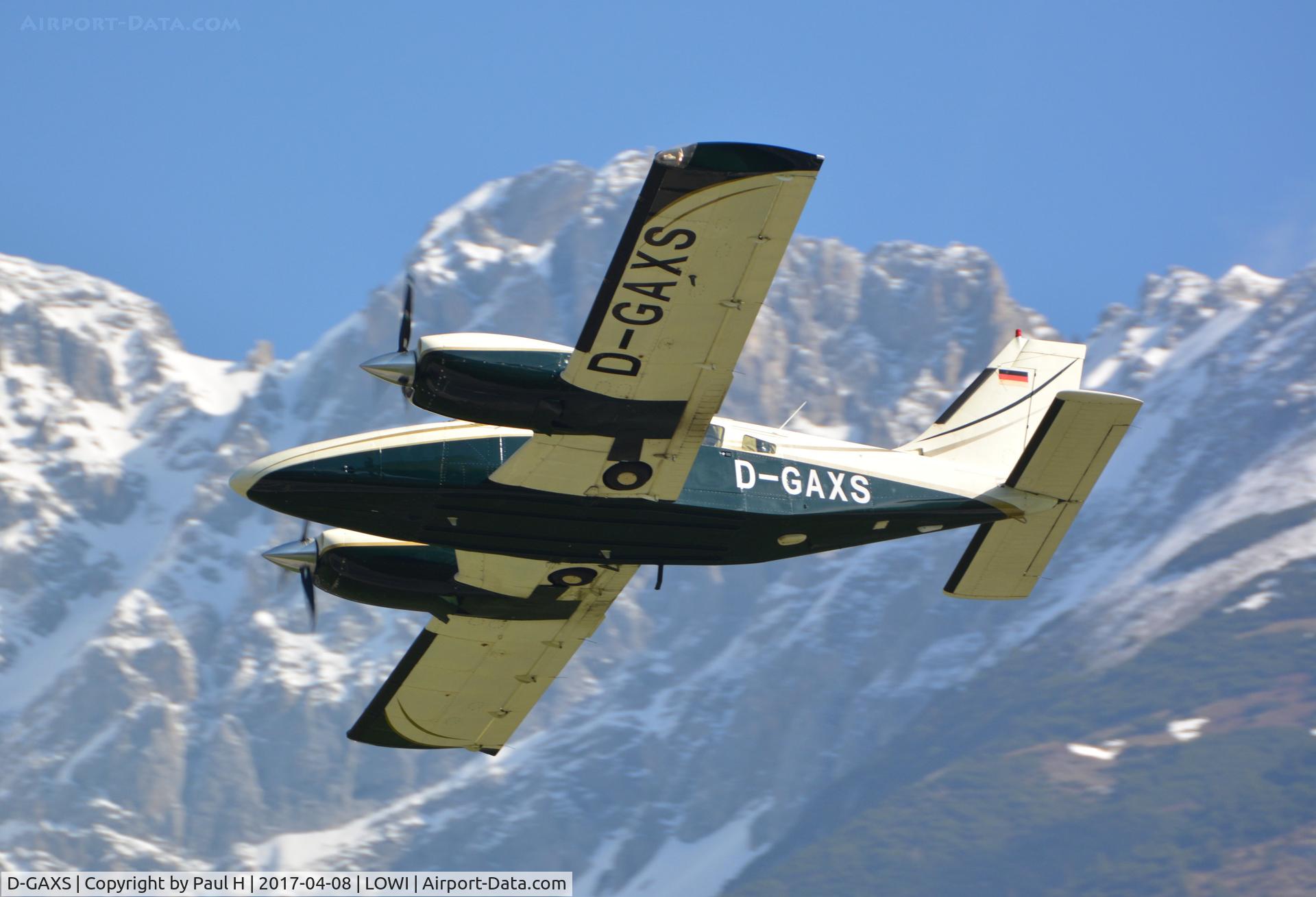 D-GAXS, 1982 Piper PA-34-220 Seneca C/N 34-8233175, Taking off from LOWI, Innsbruck with the austrian alps in the background