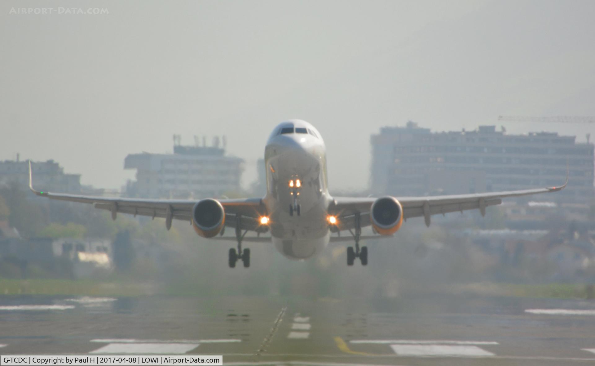 G-TCDC, 2013 Airbus A321-211 C/N 5872, Rocketing out of LOWI, Innsbruck with the austrian alps in the background
