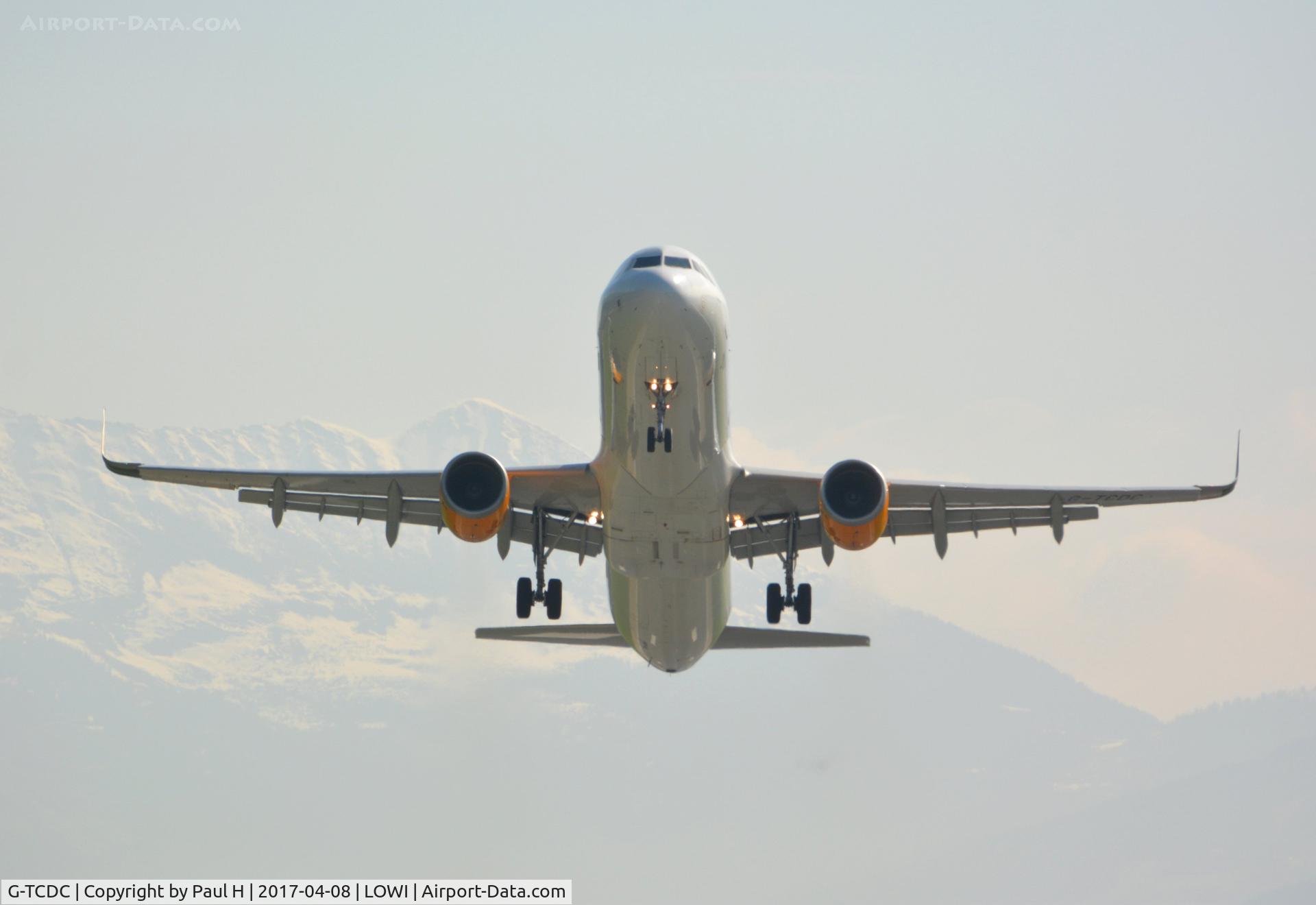 G-TCDC, 2013 Airbus A321-211 C/N 5872, Rocketing out of LOWI, Innsbruck with the austrian alps in the background