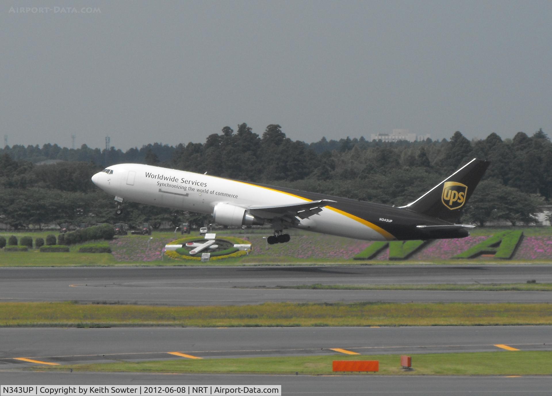 N343UP, 2011 Boeing 767-34AF C/N 37945, on climbout