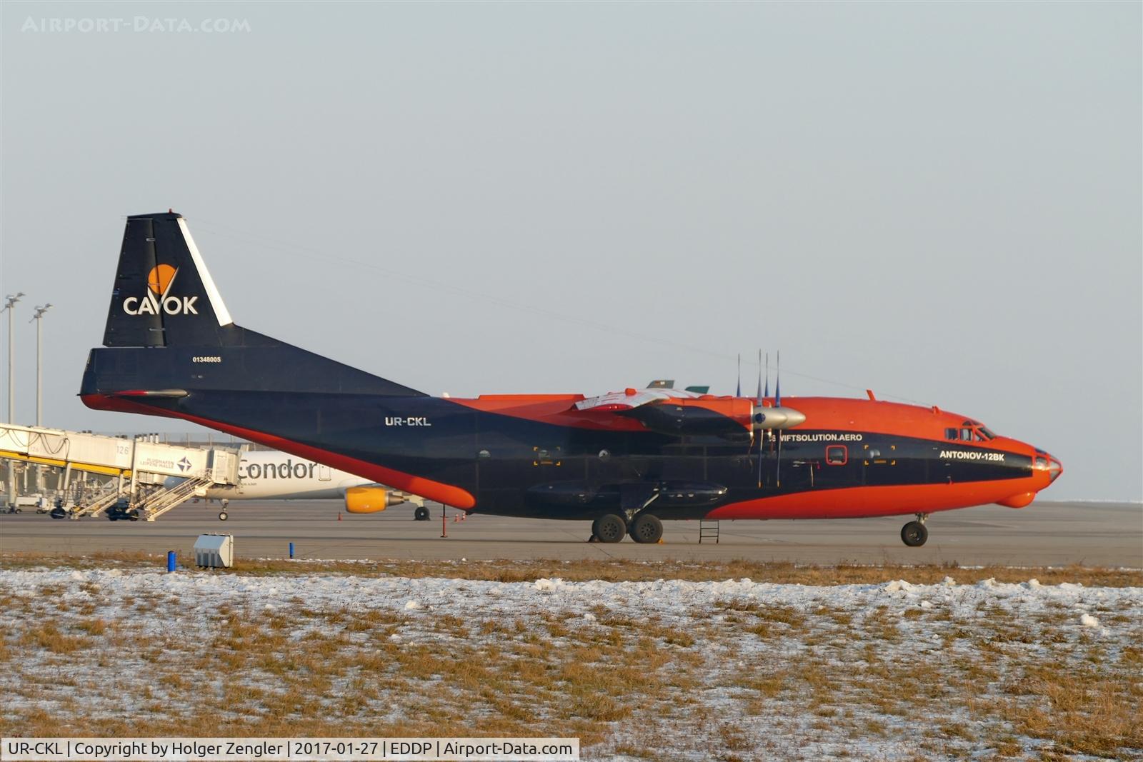 UR-CKL, 1971 Antonov An-12BP C/N 01348005, Beautiful lady on apron 1 west....