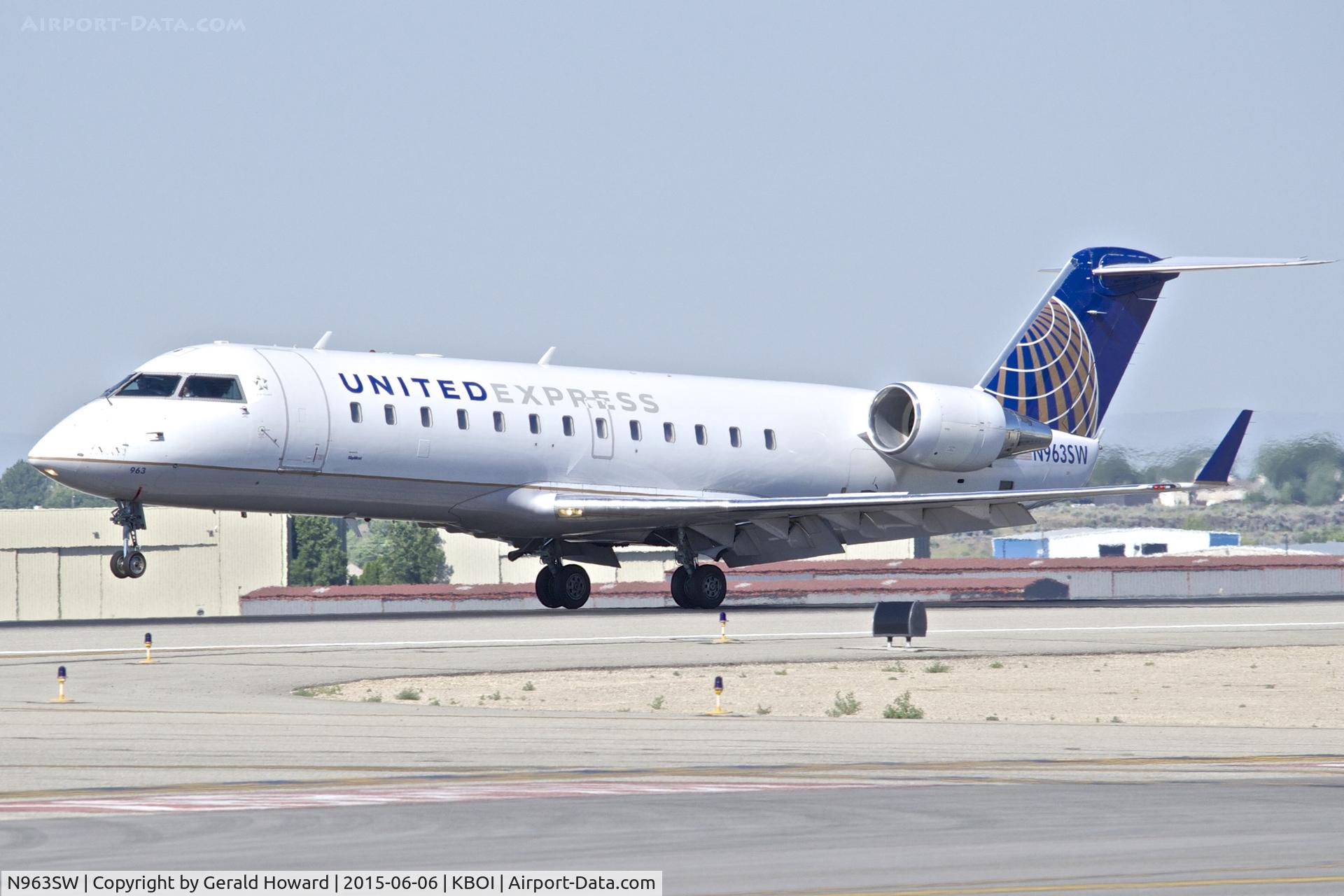 N963SW, 2003 Bombardier CRJ-200LR (CL-600-2B19) C/N 7865, Landing RWY 10L.