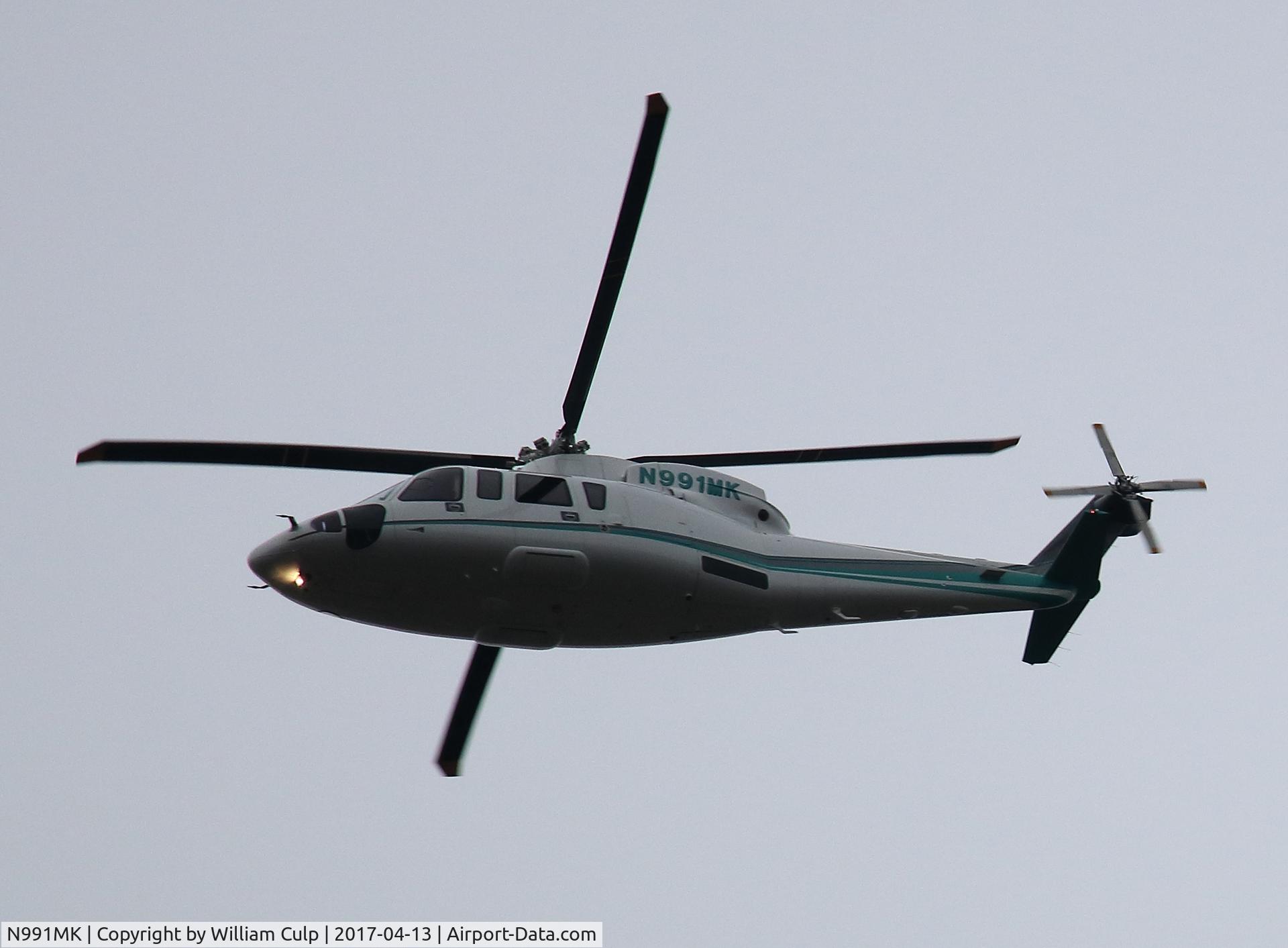 N991MK, Sikorsky S-76C C/N 760776, Seen it flying over Peace Valley Park, Bucks County Pa.