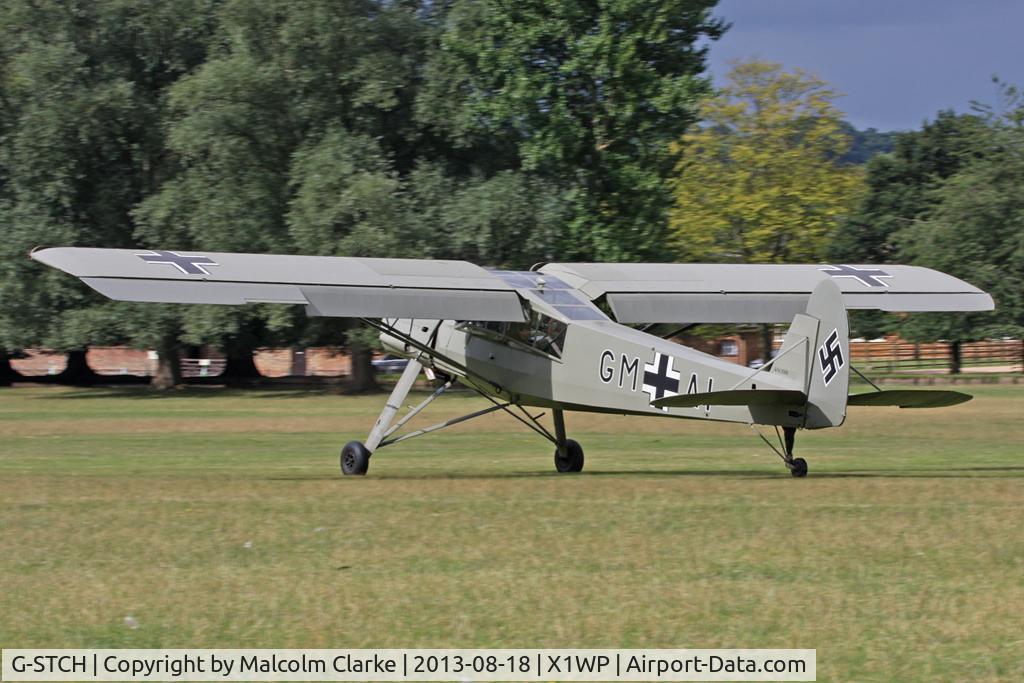 G-STCH, 1942 Fieseler Fi-156A-1 Storch C/N 2088, Fieseler Fi-156A-1 Storch at The De Havilland Moth Club's 28th International Moth Rally at Woburn Abbey. August 18th 2013.