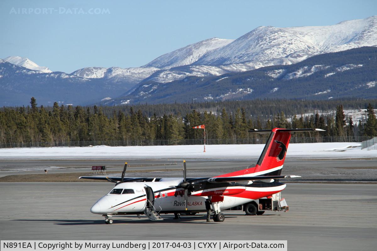 N891EA, 1992 De Havilland Canada DHC-8-102 Dash 8 C/N 335, On the ramp at Whitehorse, Yukon, preparing for departure.