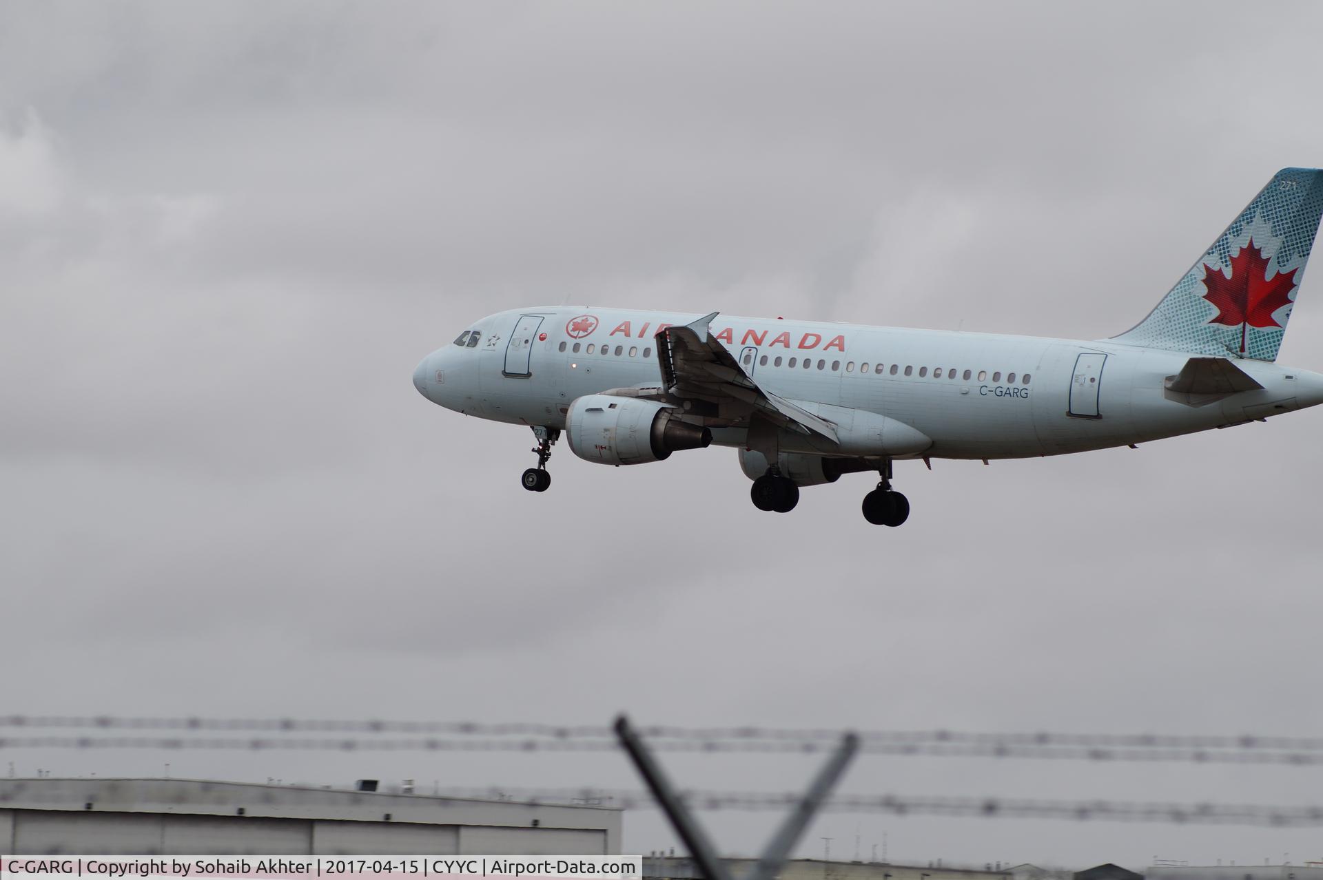 C-GARG, 1997 Airbus A319-114 C/N 742, A319 short final on RWY 35L YYC