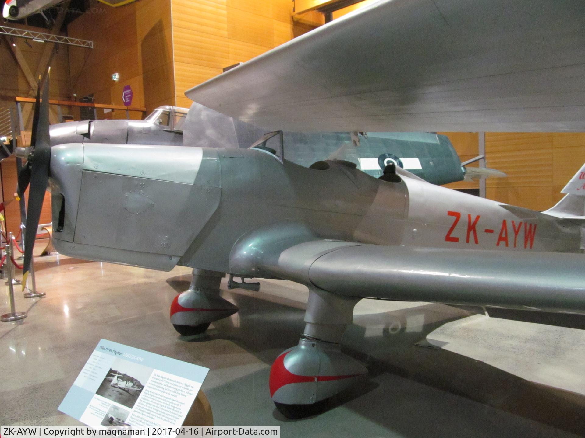 ZK-AYW, 1938 Miles M14A Hawk Trainer 3 C/N 779, thought this was a bi-plane at first - but hiding under wing of a DC-3 at MOTAT