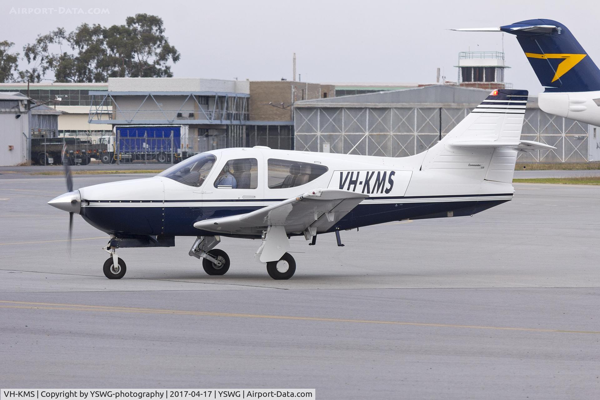VH-KMS, 2000 Rockwell Commander 114B C/N 14680, Commander 114B taxiing at Wagga Wagga Airport.