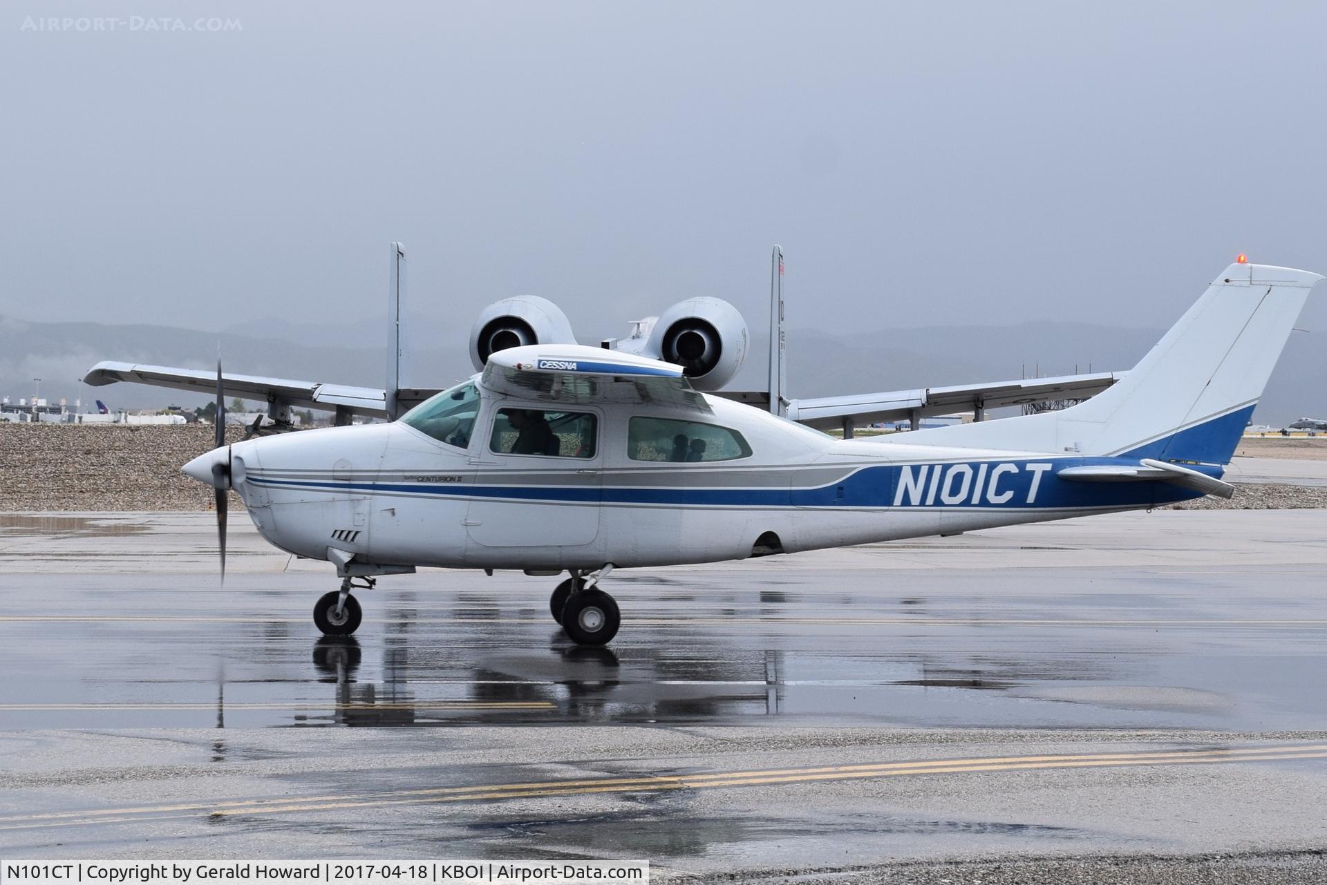 N101CT, 1977 Cessna T210M Turbo Centurion C/N 210-62322, Taxiing behind an A-10C on the de arm pad. Hopefully the engines are at idle.