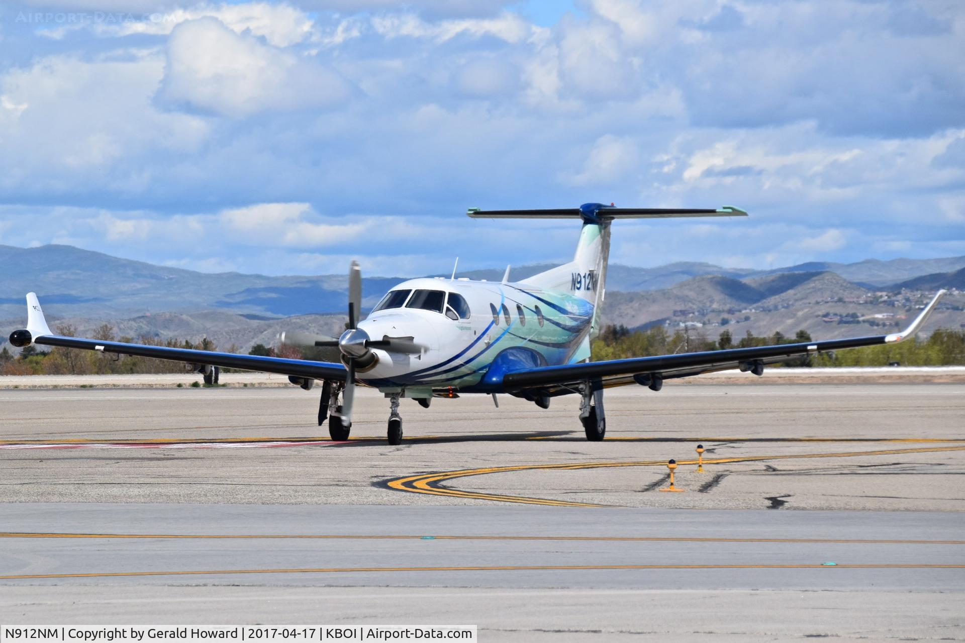 N912NM, 1997 Pilatus PC-12/45 C/N 169, Coming off RWY 28L.