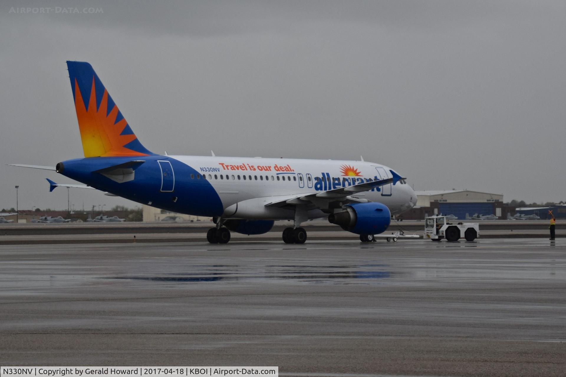N330NV, 2006 Airbus A319-111 C/N 2786, Push back from the gate.