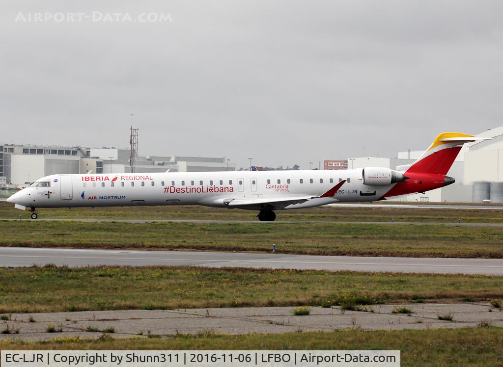 EC-LJR, 2010 Bombardier CRJ-1000ER NG (CL-600-2E25) C/N 19002, Taxiing holding point rwy 32R with '#Destino Liebana / Cantabria Infinita' titles...