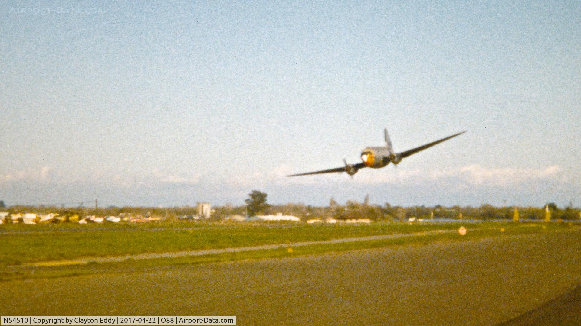 N54510, 1944 Curtiss C-46D-10-CU Commando C/N 32971, Old Rio Vista Airport in California May 1982.