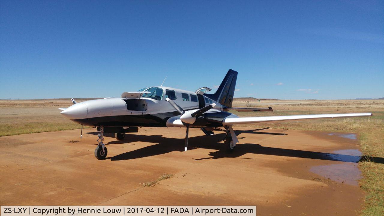 ZS-LXY, Cessna 402C C/N 402C-0453, At De Aar April 2017
