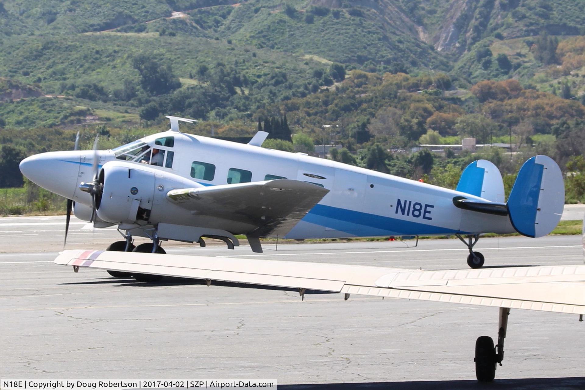 N18E, 1958 Beech E18S C/N BA-383, 1958 Beech SUPER E18S, two Pratt & Whitney R-985 450 Hp radials, taxi back after landing Rwy 22, returning visitor from the high desert.