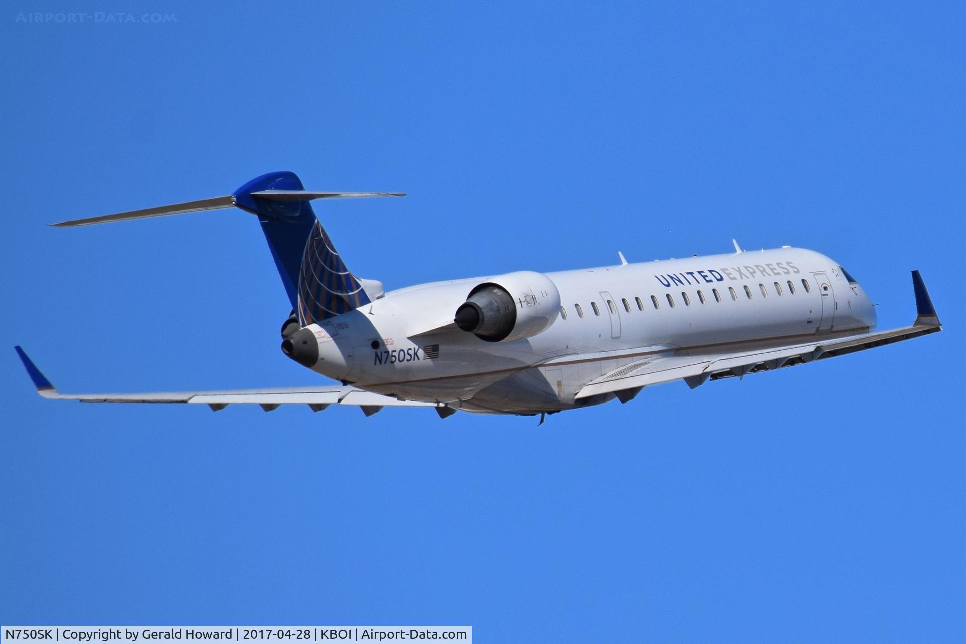 N750SK, 2005 Bombardier CRJ-701ER (CL-600-2C10) Regional Jet C/N 10207, Departing BOI.
