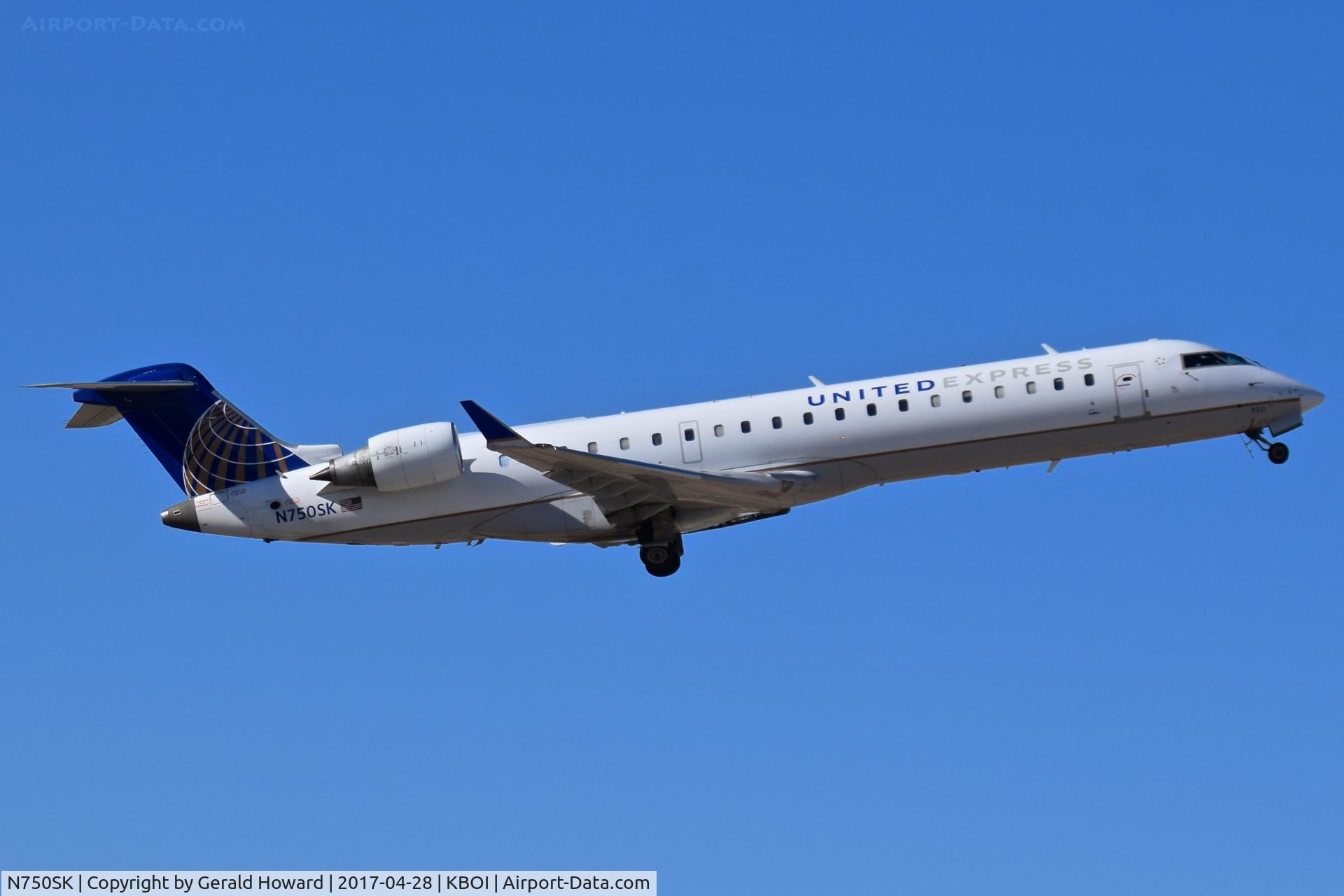 N750SK, 2005 Bombardier CRJ-701ER (CL-600-2C10) Regional Jet C/N 10207, Climb out from RWY 28R.