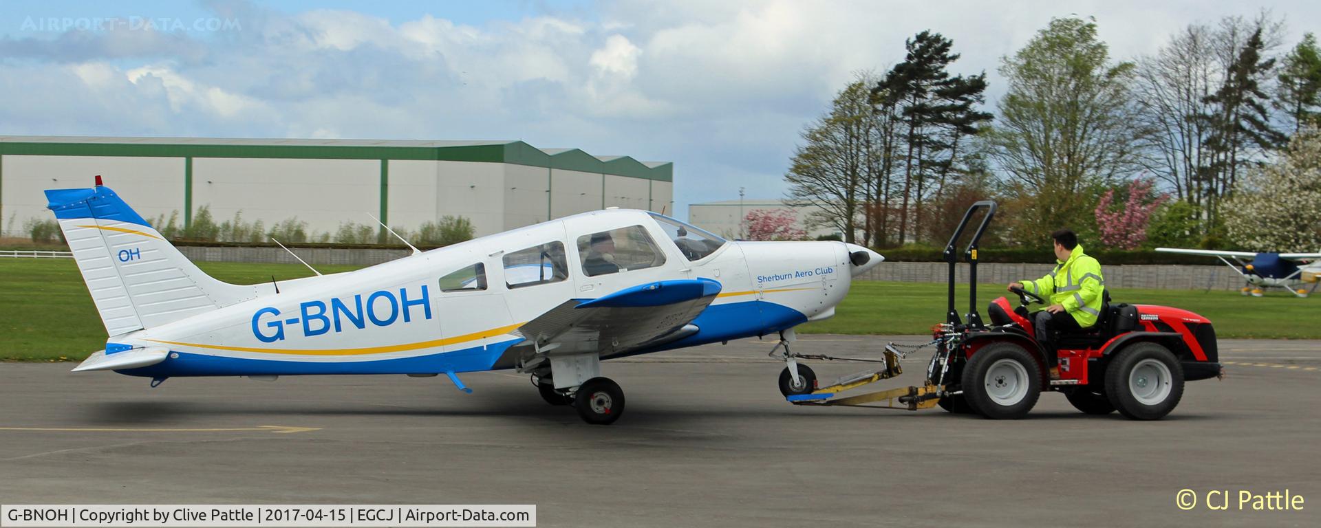 G-BNOH, 1987 Piper PA-28-161 Cherokee Warrior II C/N 2816016, Aircraft towing operations at EGCJ