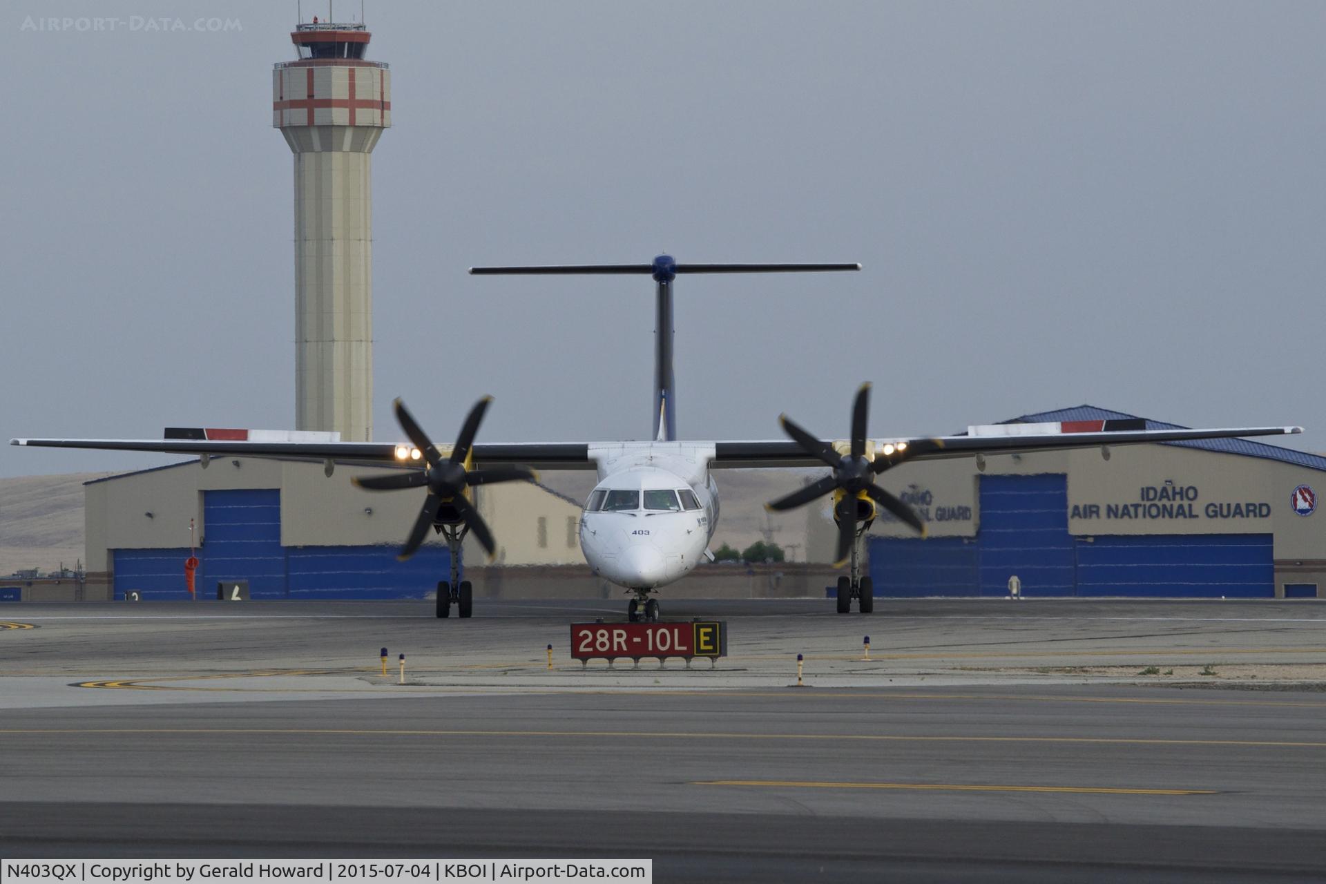 N403QX, 2001 De Havilland Canada DHC-8-402 Dash 8 C/N 4037, On Echo from RWY 28R.