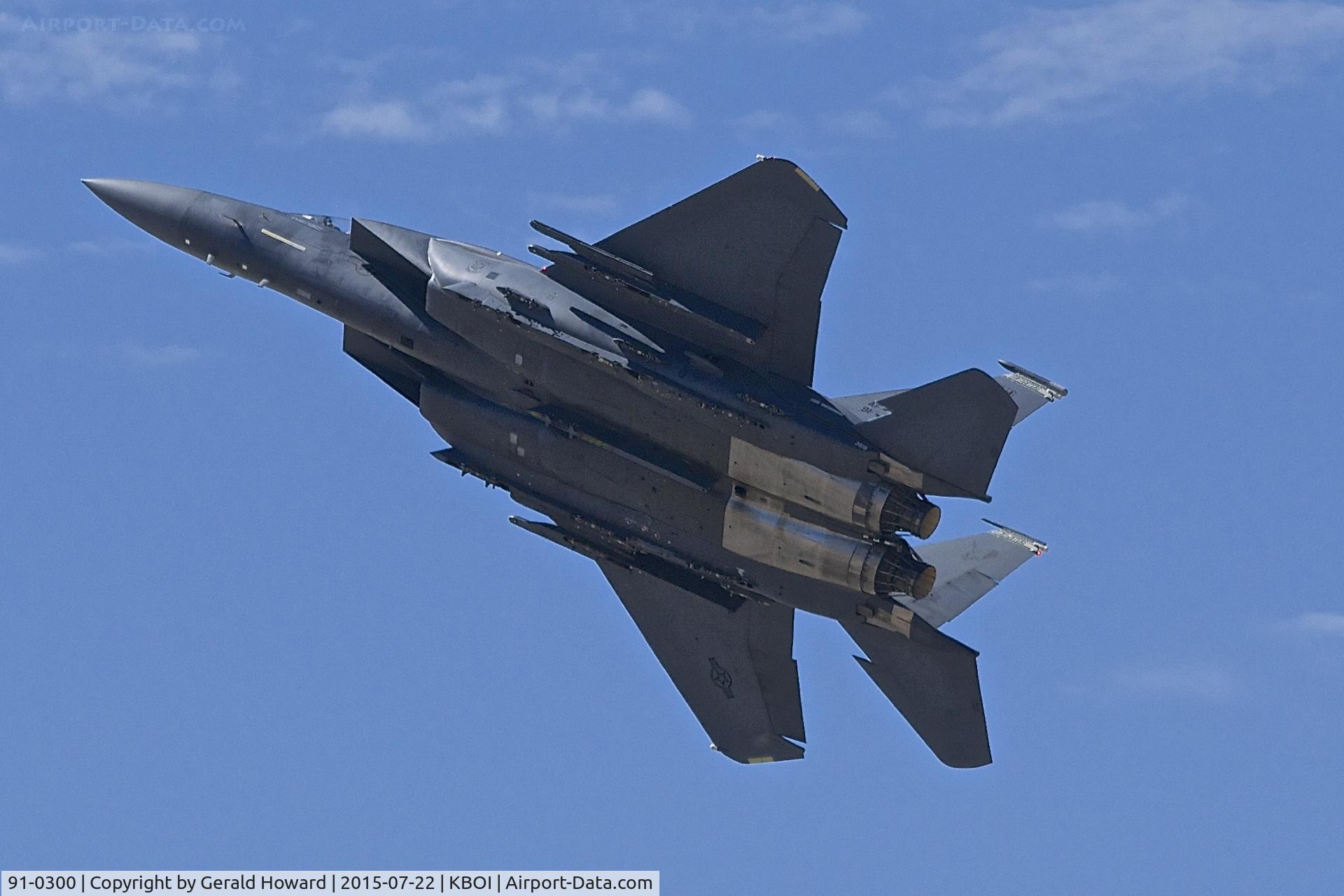 91-0300, 1991 McDonnell Douglas F-15E Strike Eagle C/N 1207/E165, Making a low pass over RWY 10R.  391st Fighter Sq. 