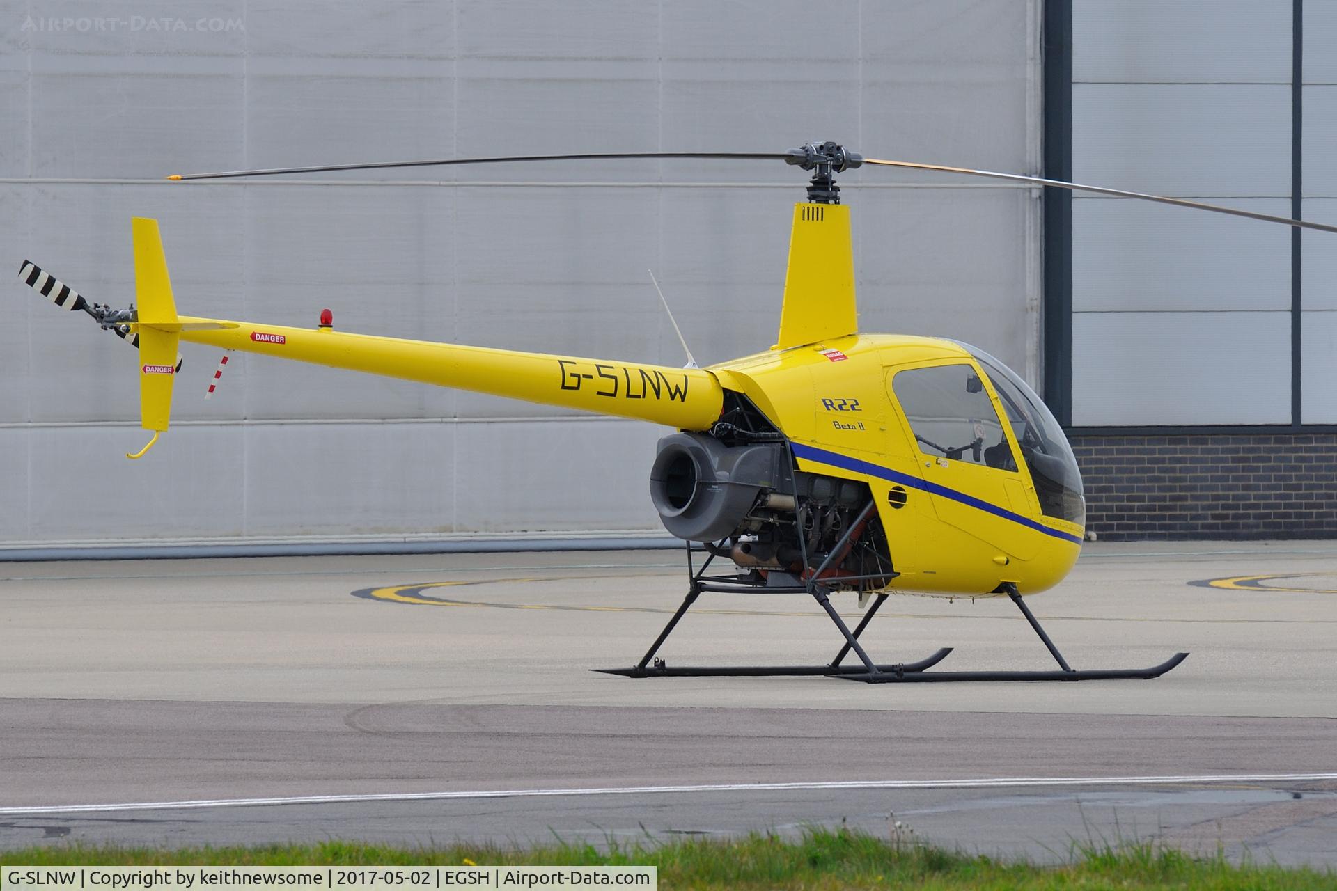 G-SLNW, 2003 Robinson R22 Beta II C/N 3524, With 'taped on' registration.
