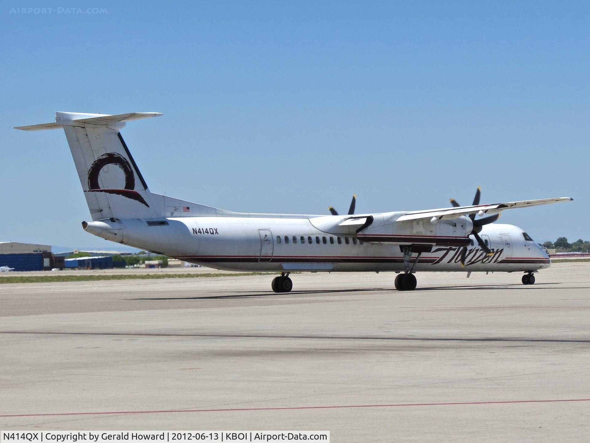 N414QX, 2002 Bombardier DHC-8-402 Dash 8 C/N 4061, Departing the ramp.