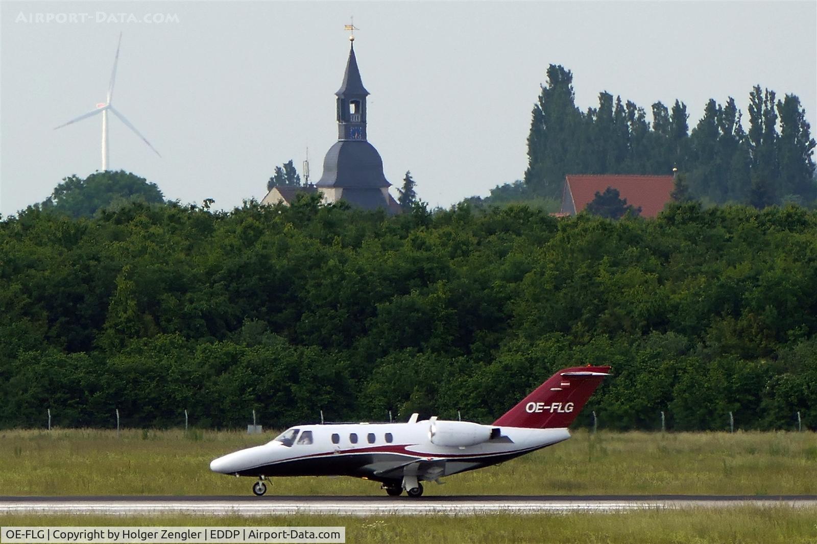 OE-FLG, 1995 Cessna 525 CitationJet CJ1 C/N 525-0103, On taxi along rwy 26R....